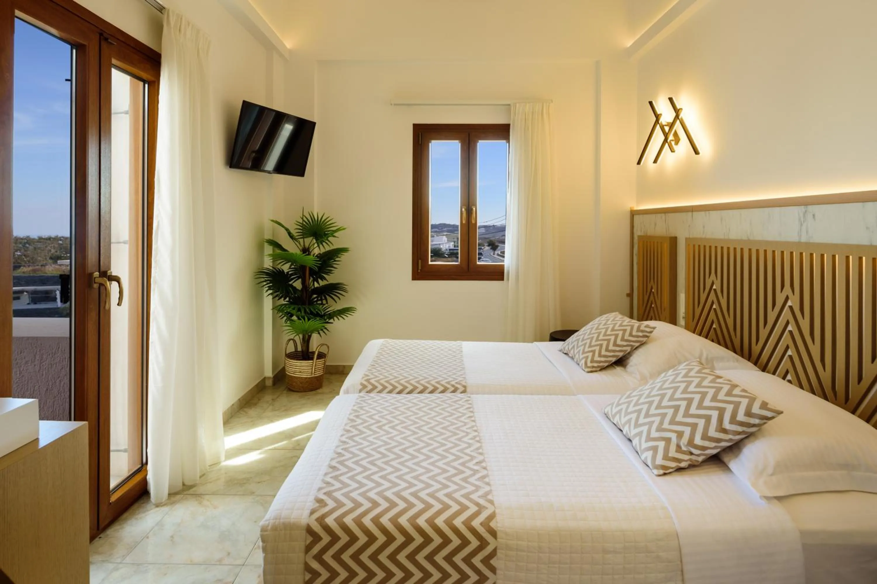 Bed in Astir Thira Hotel
