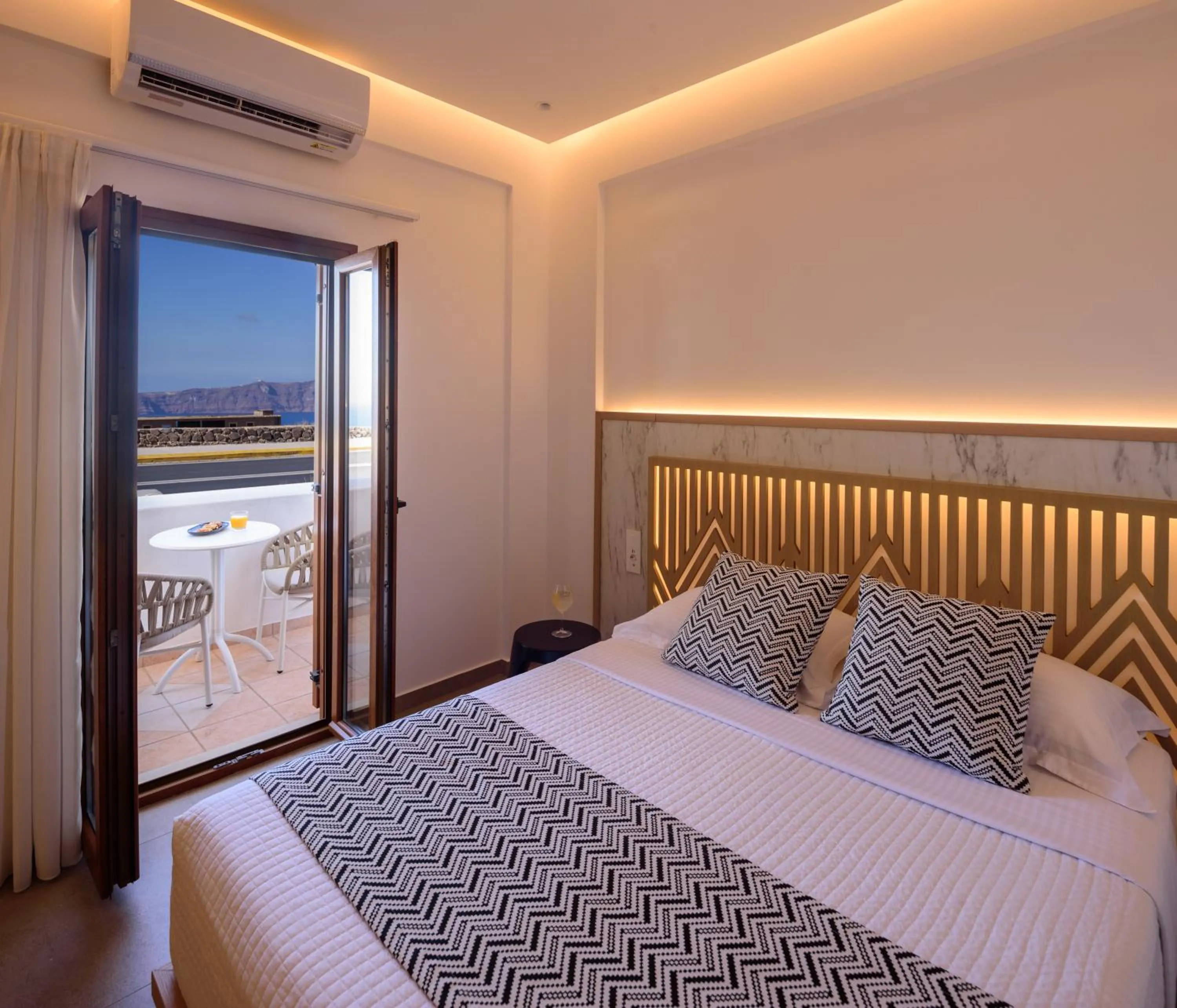 Bed in Astir Thira Hotel