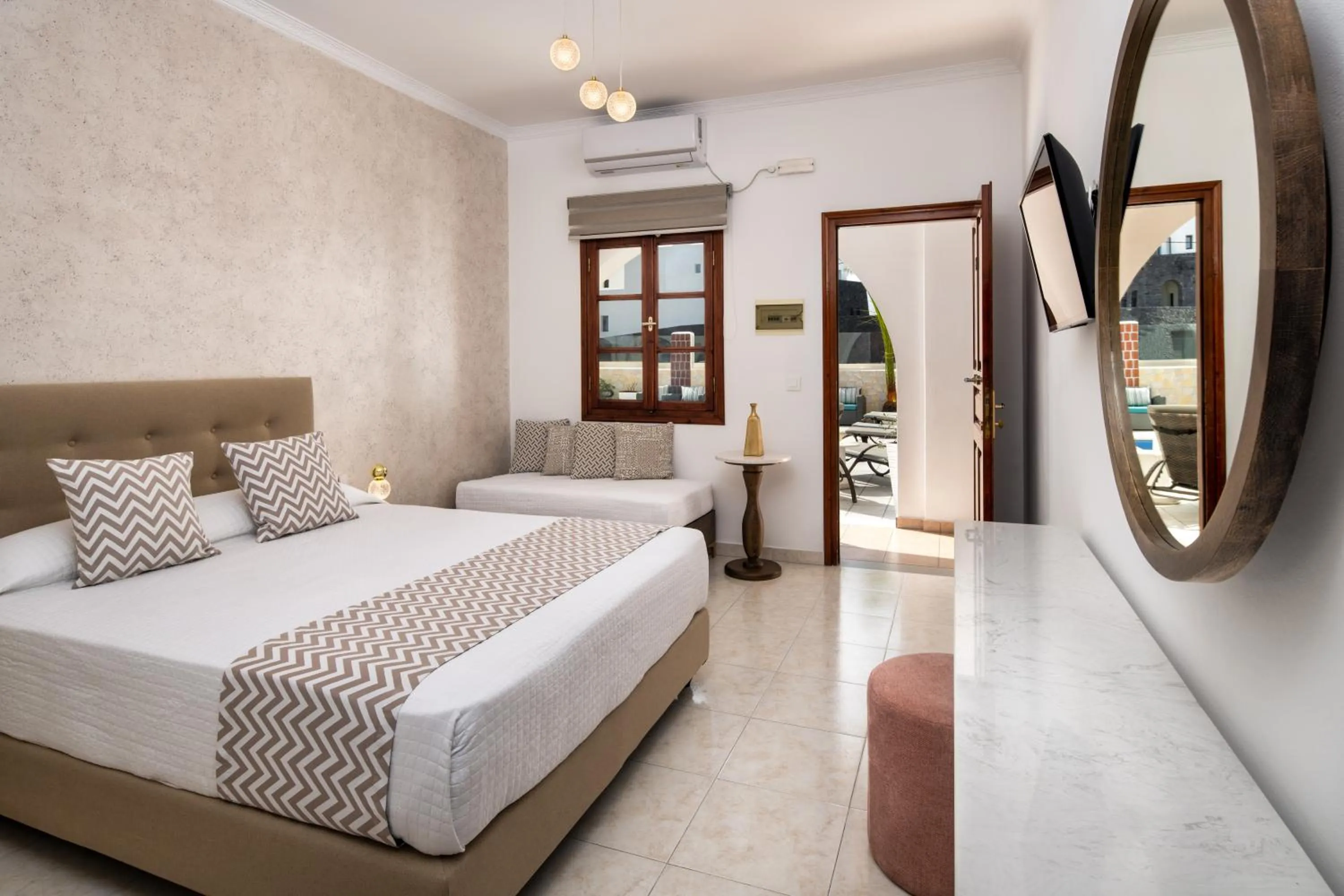 Bed in Astir Thira Hotel