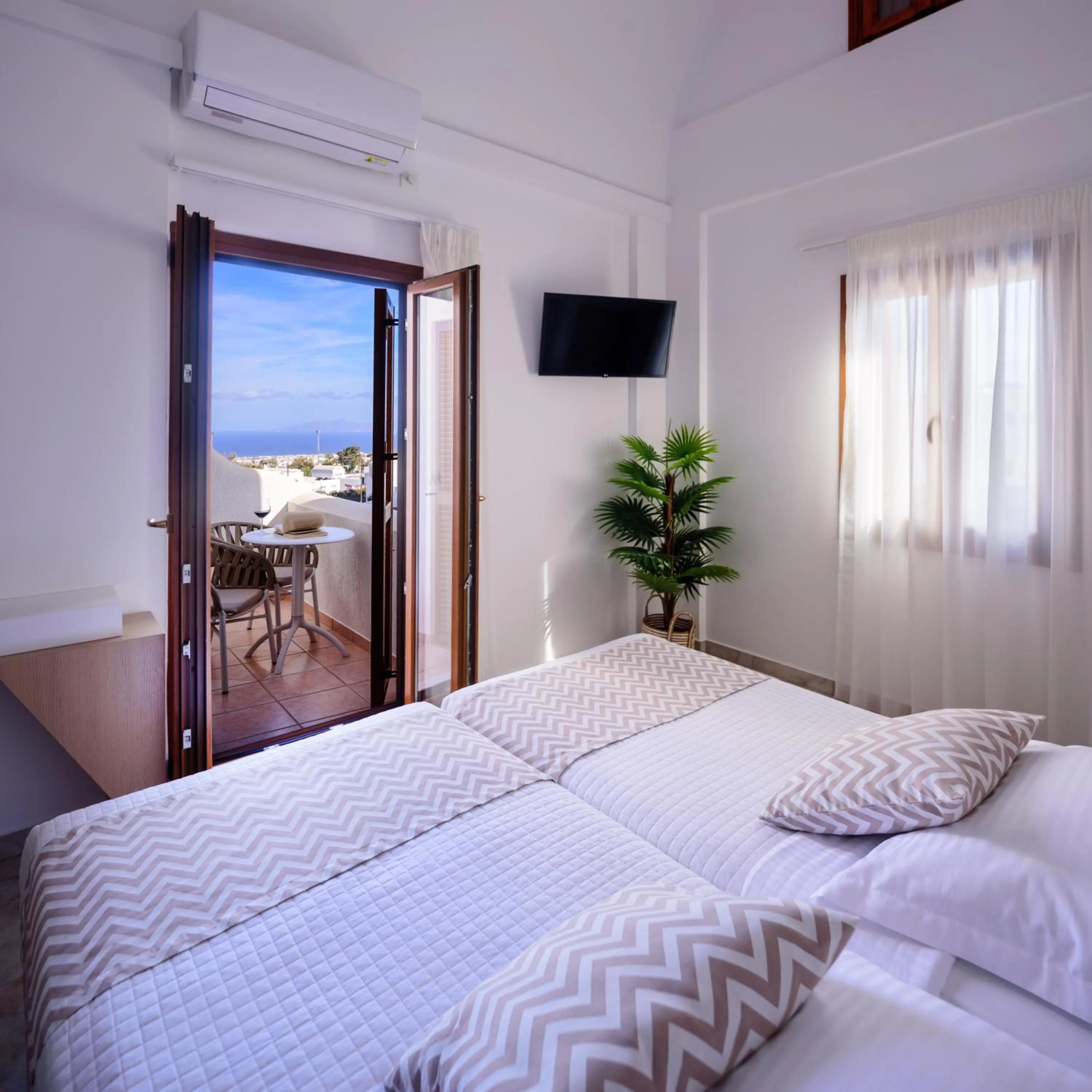 Bed in Astir Thira Hotel