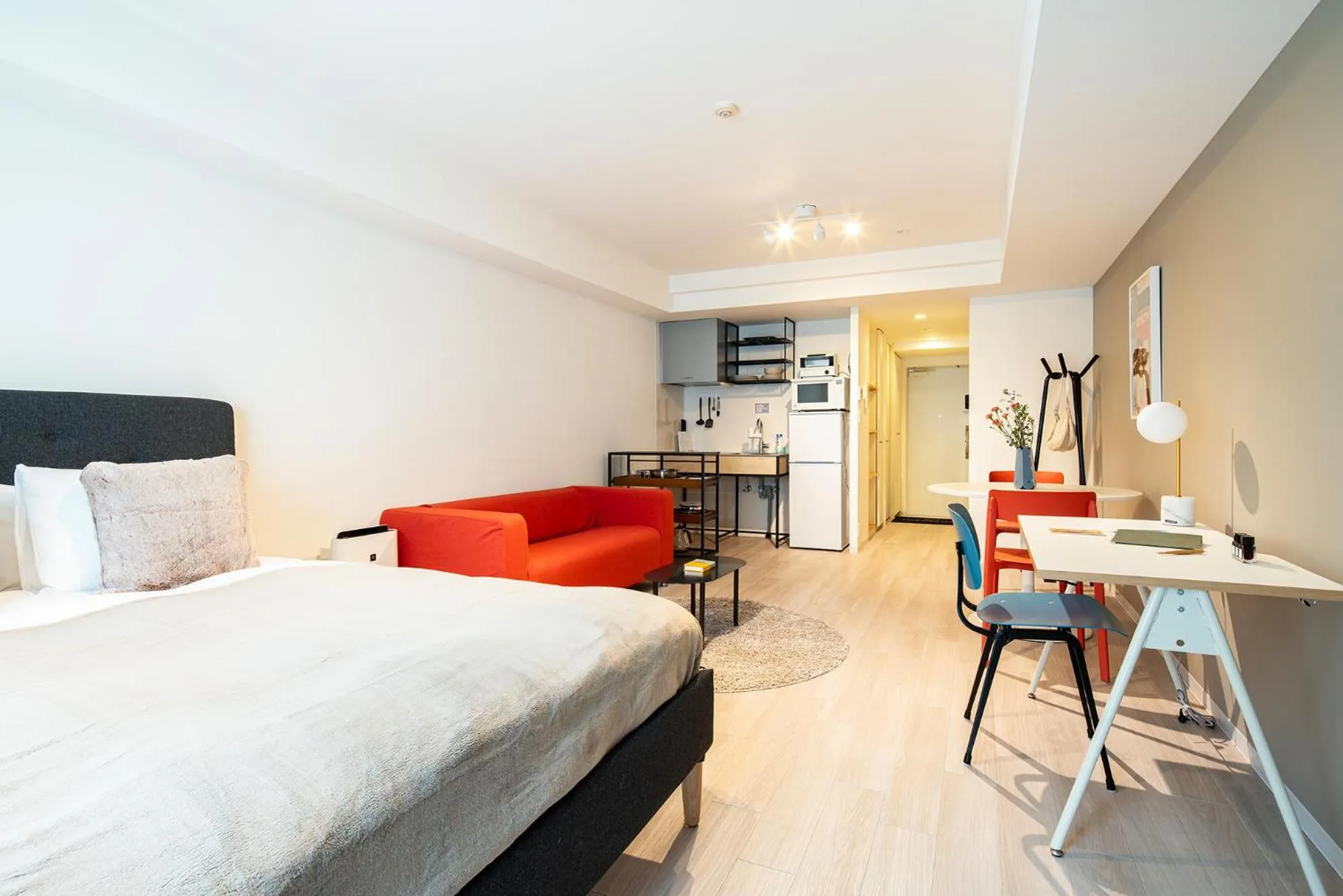 Living room, Bed in Section L Residence Ginza