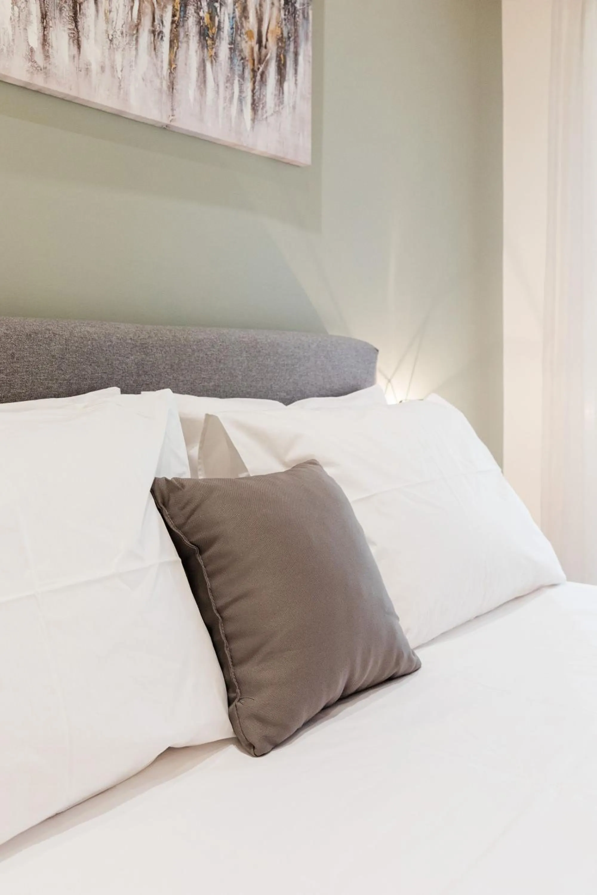 Bed in Seadrop Suites