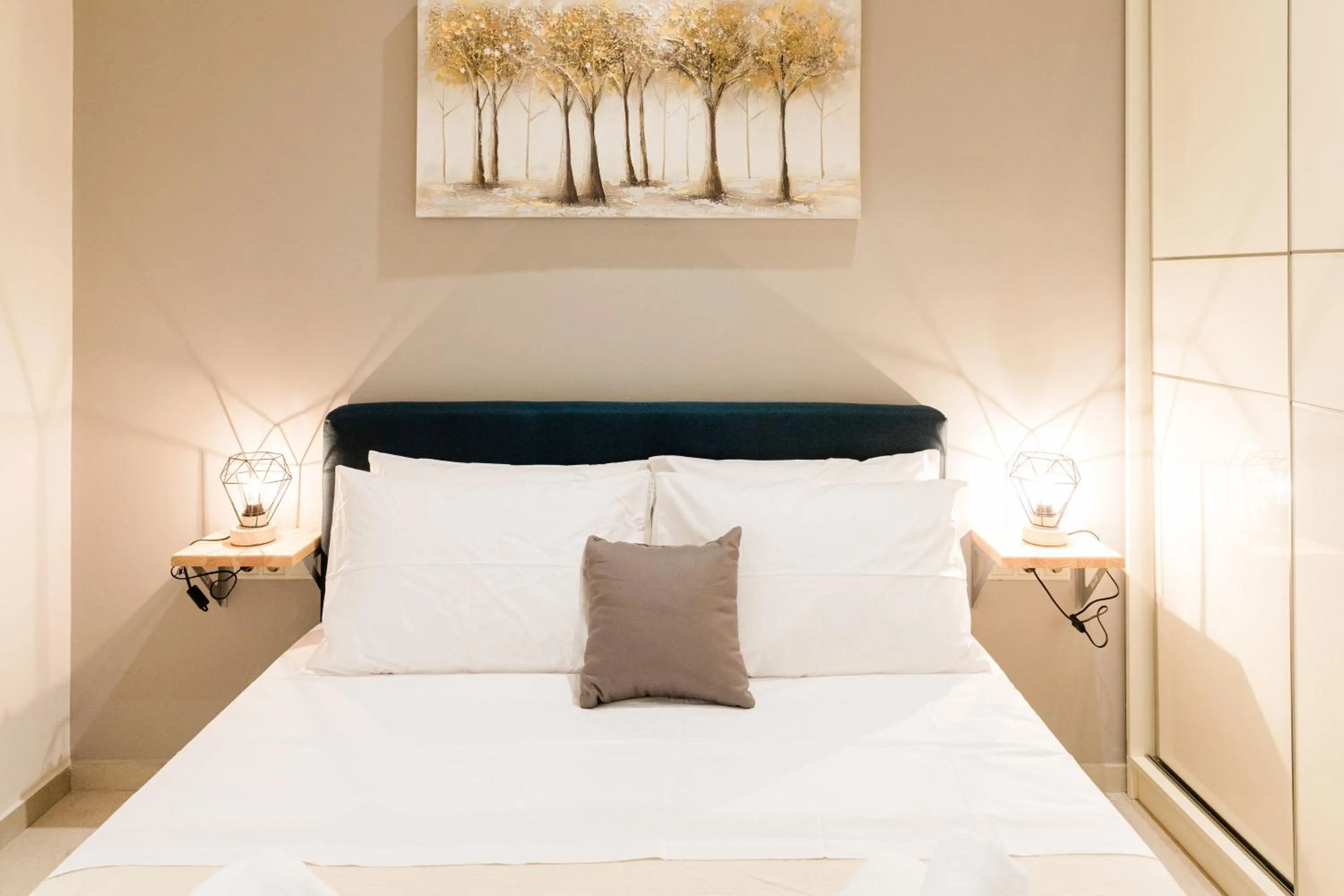 Bed in Seadrop Suites