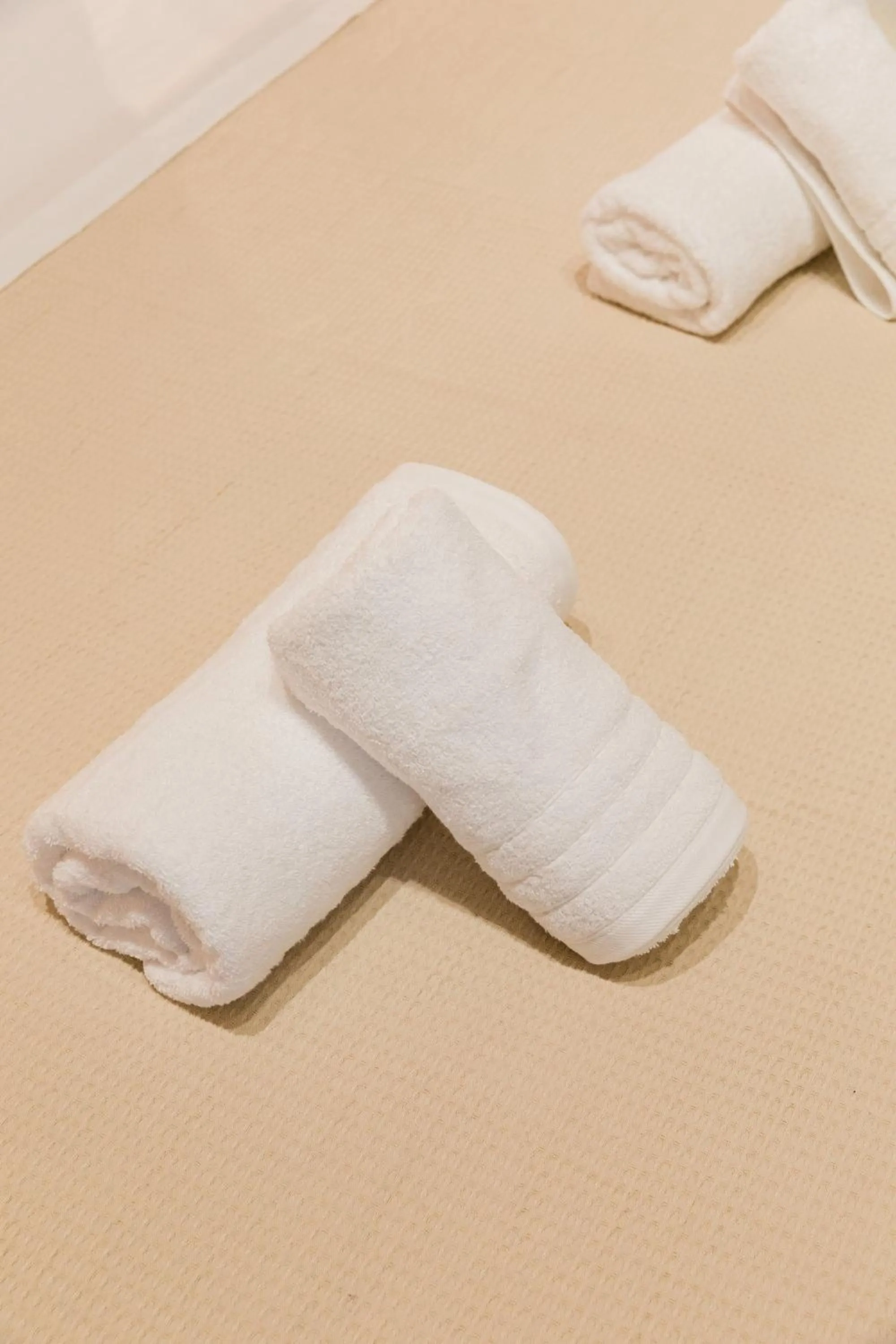 towels, Bed in Seadrop Suites