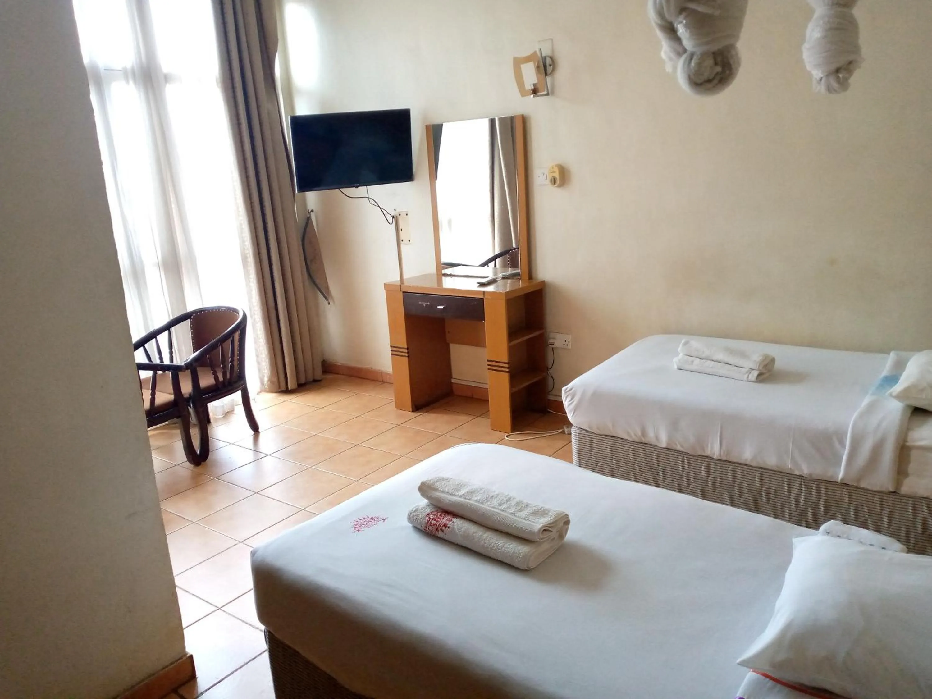 Bed in DOUBLE FIVE HOTEL