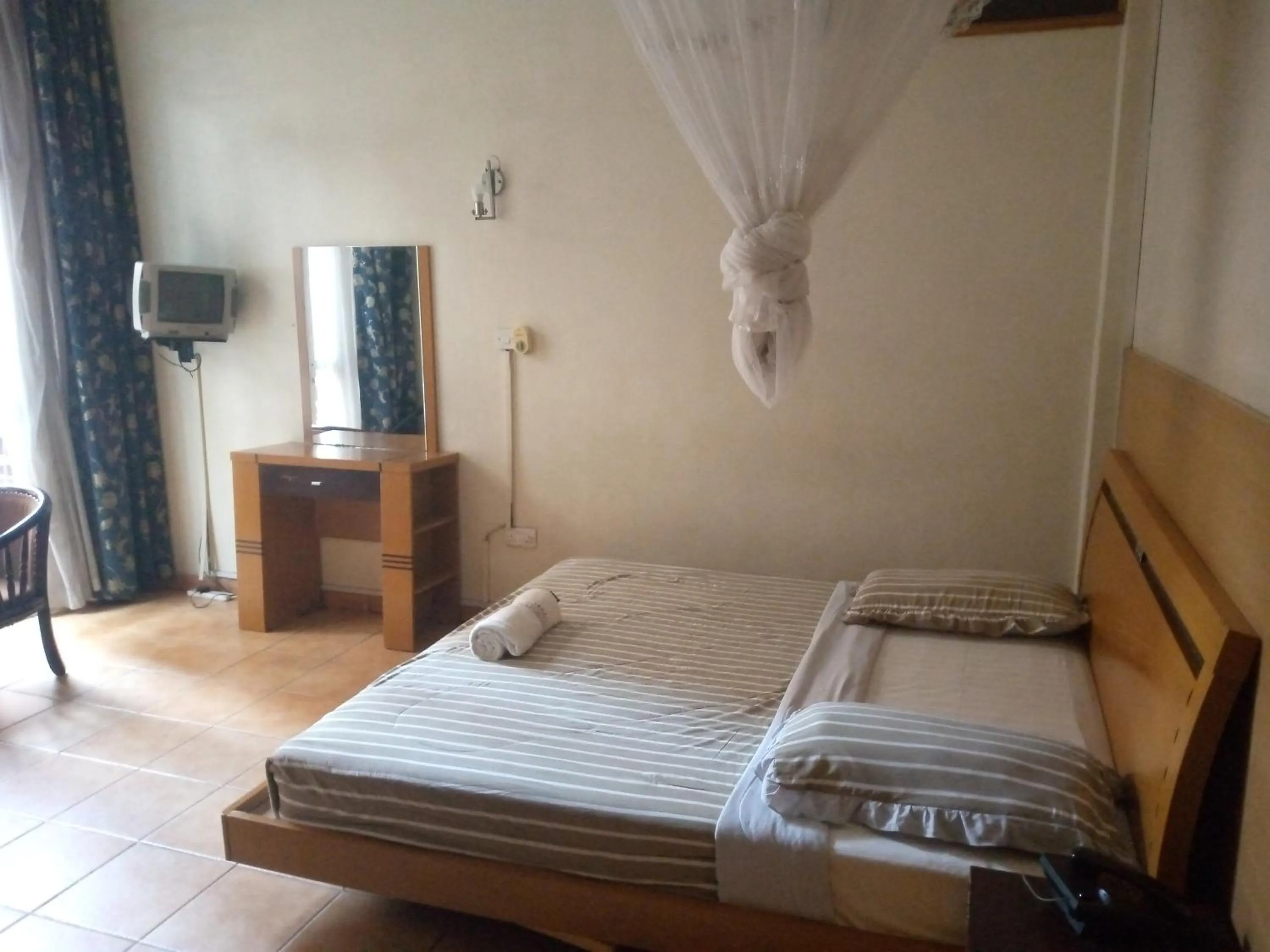 Bed in DOUBLE FIVE HOTEL