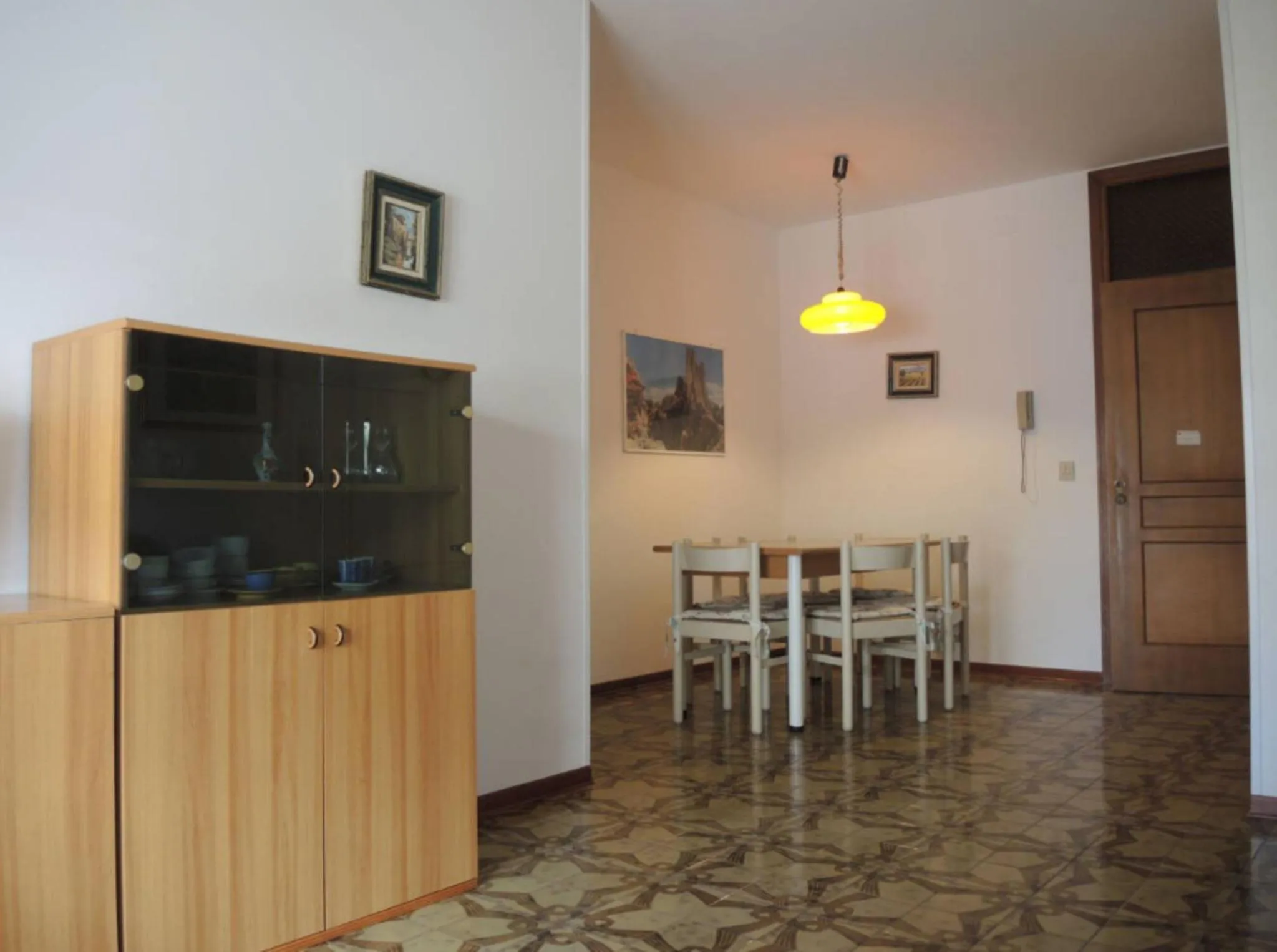 Dining area in Family apartment steps from Pluto Beach