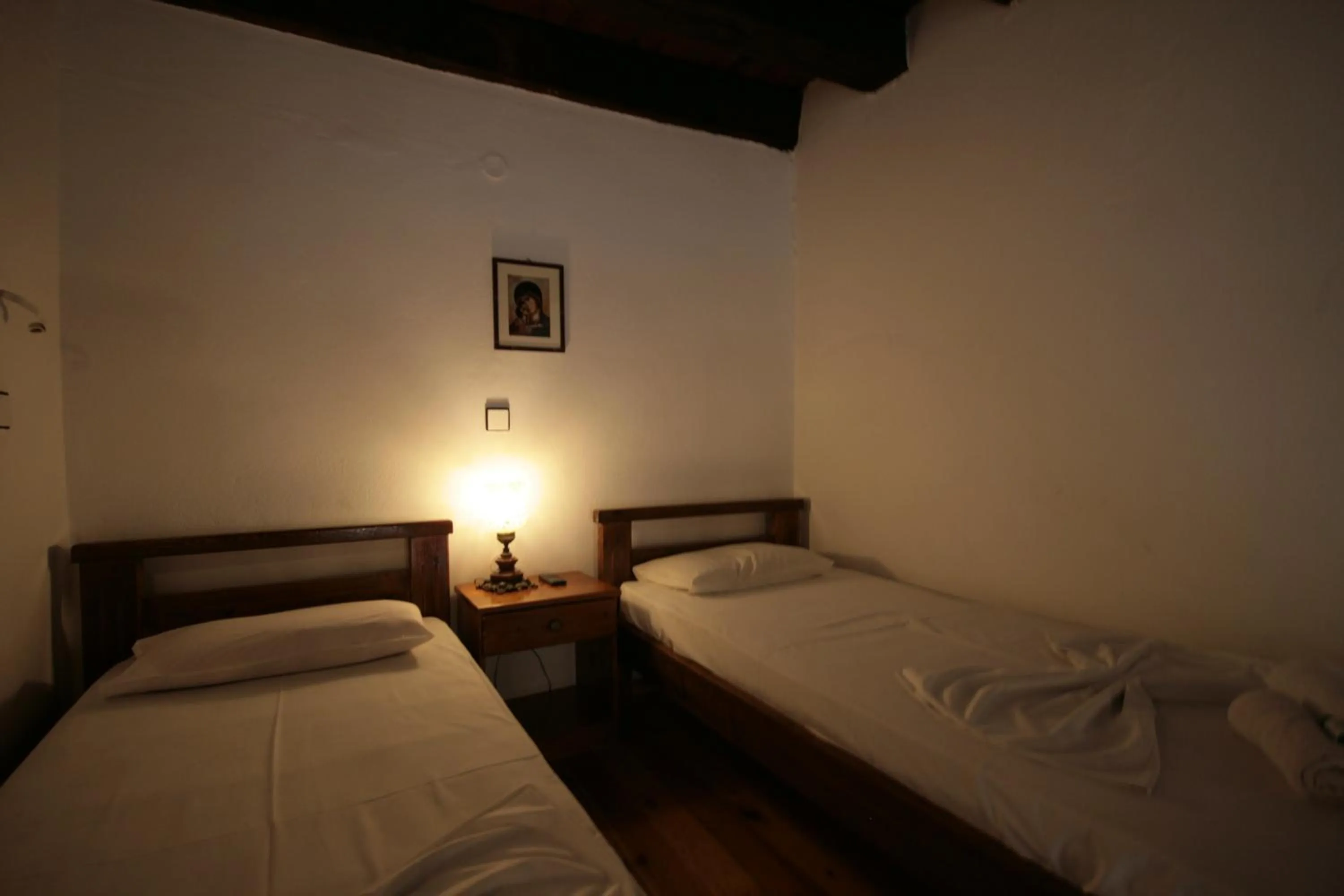 Bed in Chania Rooms