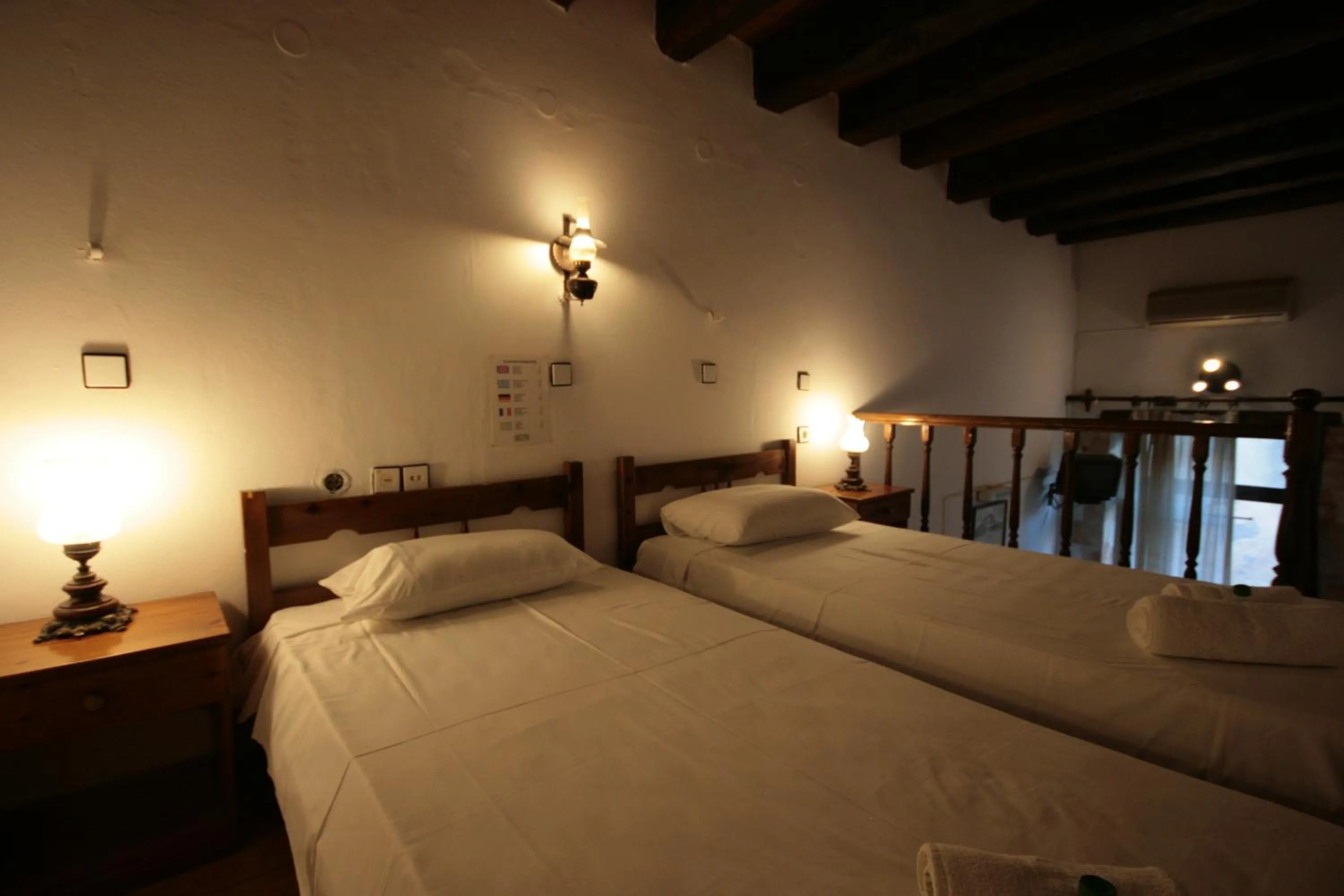 Bed in Chania Rooms