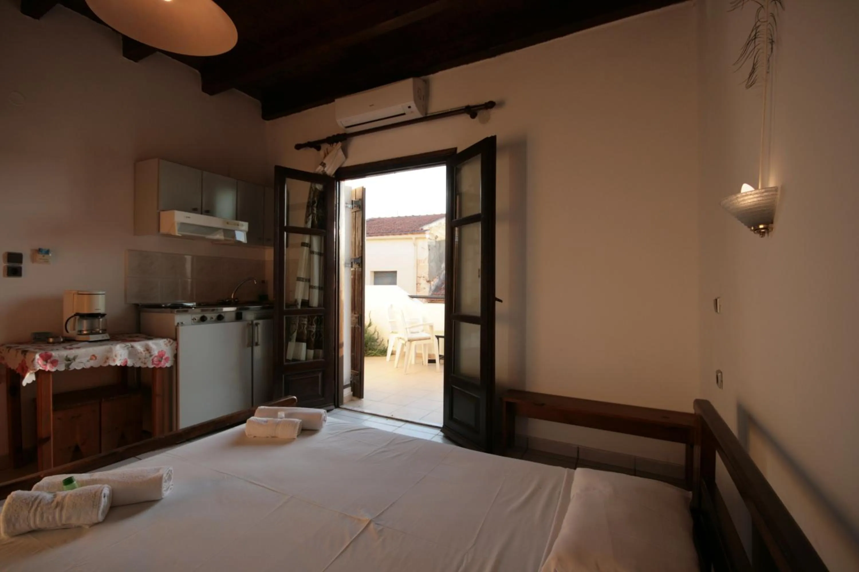 Bed in Chania Rooms