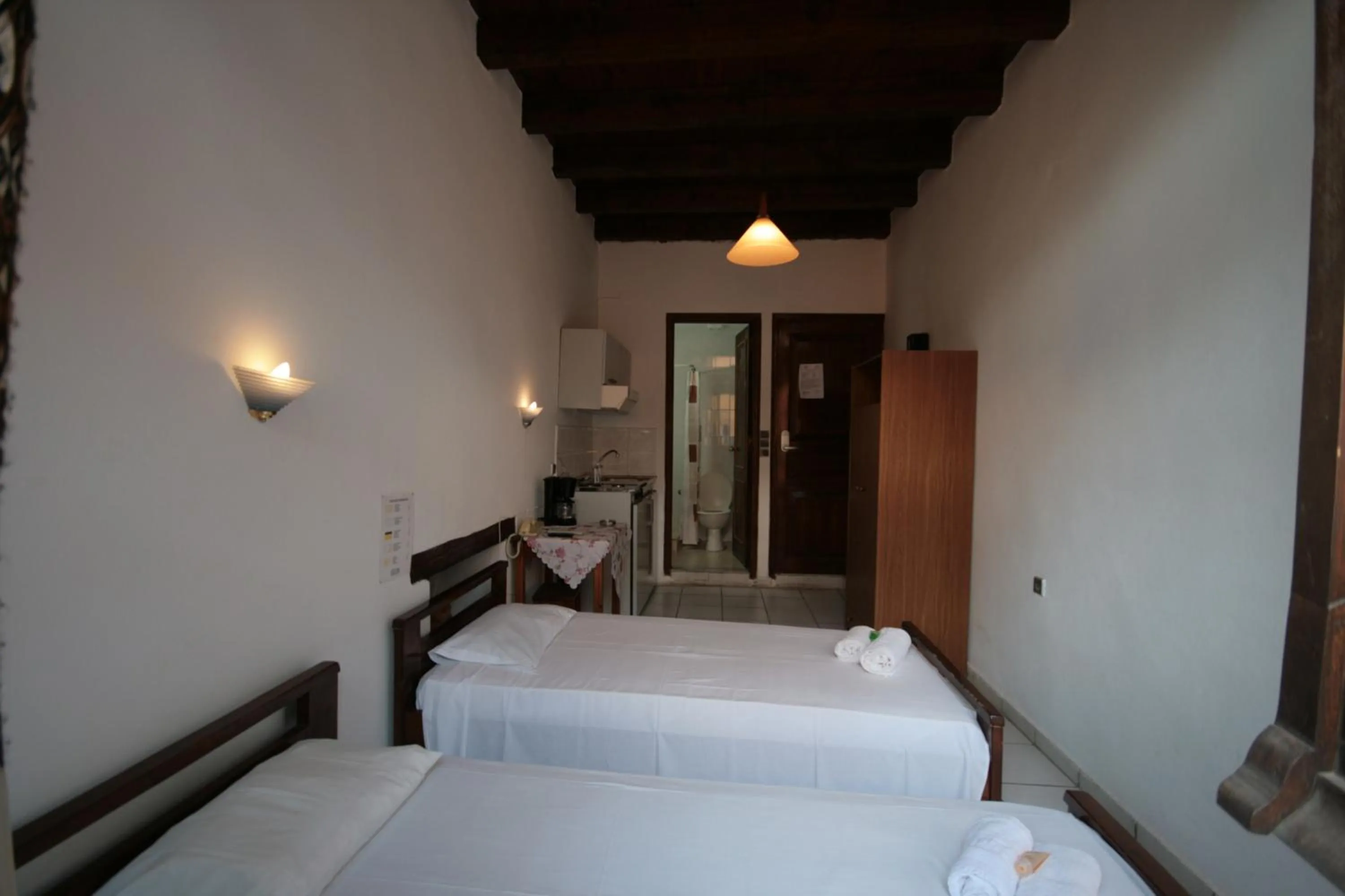 Bed in Chania Rooms