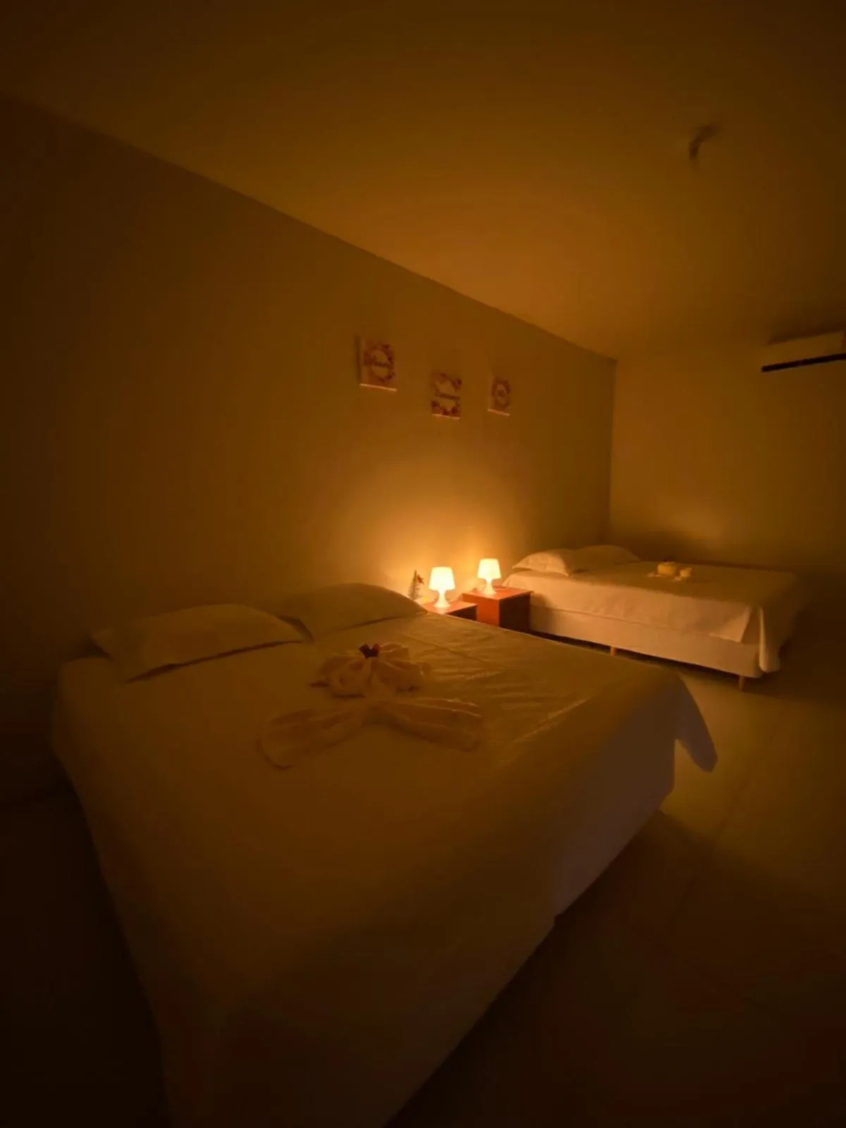 Bed in POUSADA ESTRELA DA MANHÃ