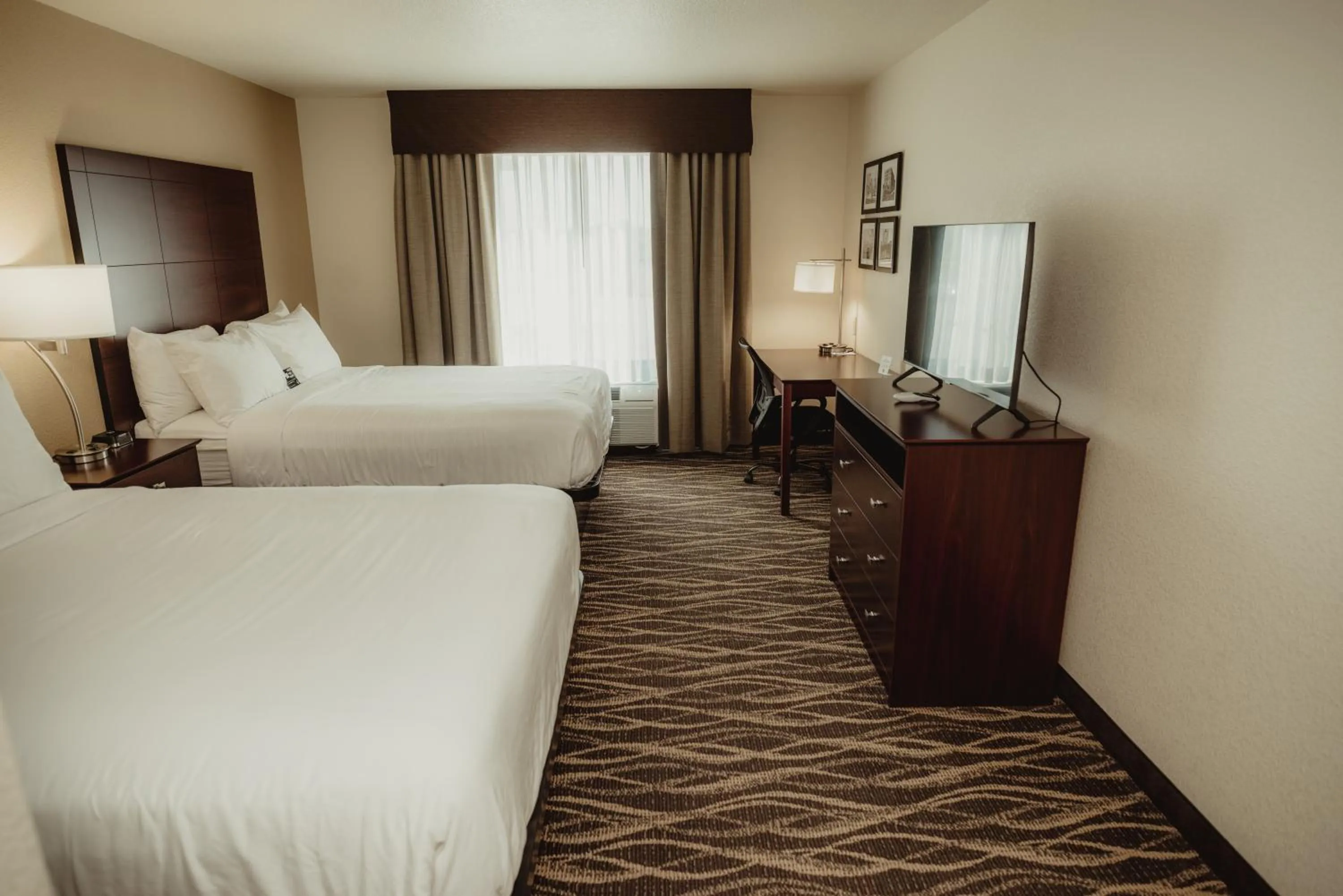 Bedroom, Bed in Cobblestone Hotel & Suites - Ottumwa