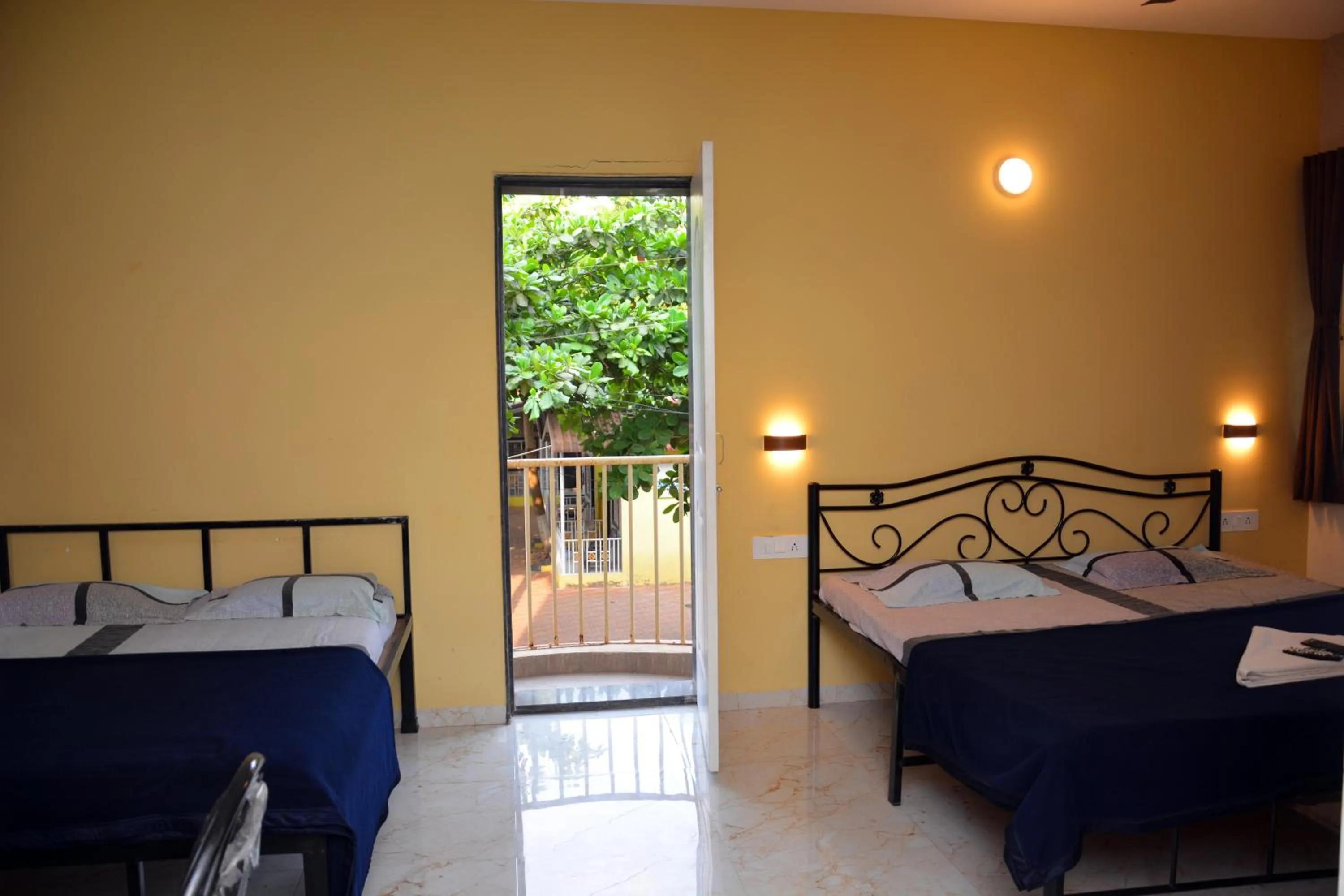 Bed in Shree Swami Samarth Resort