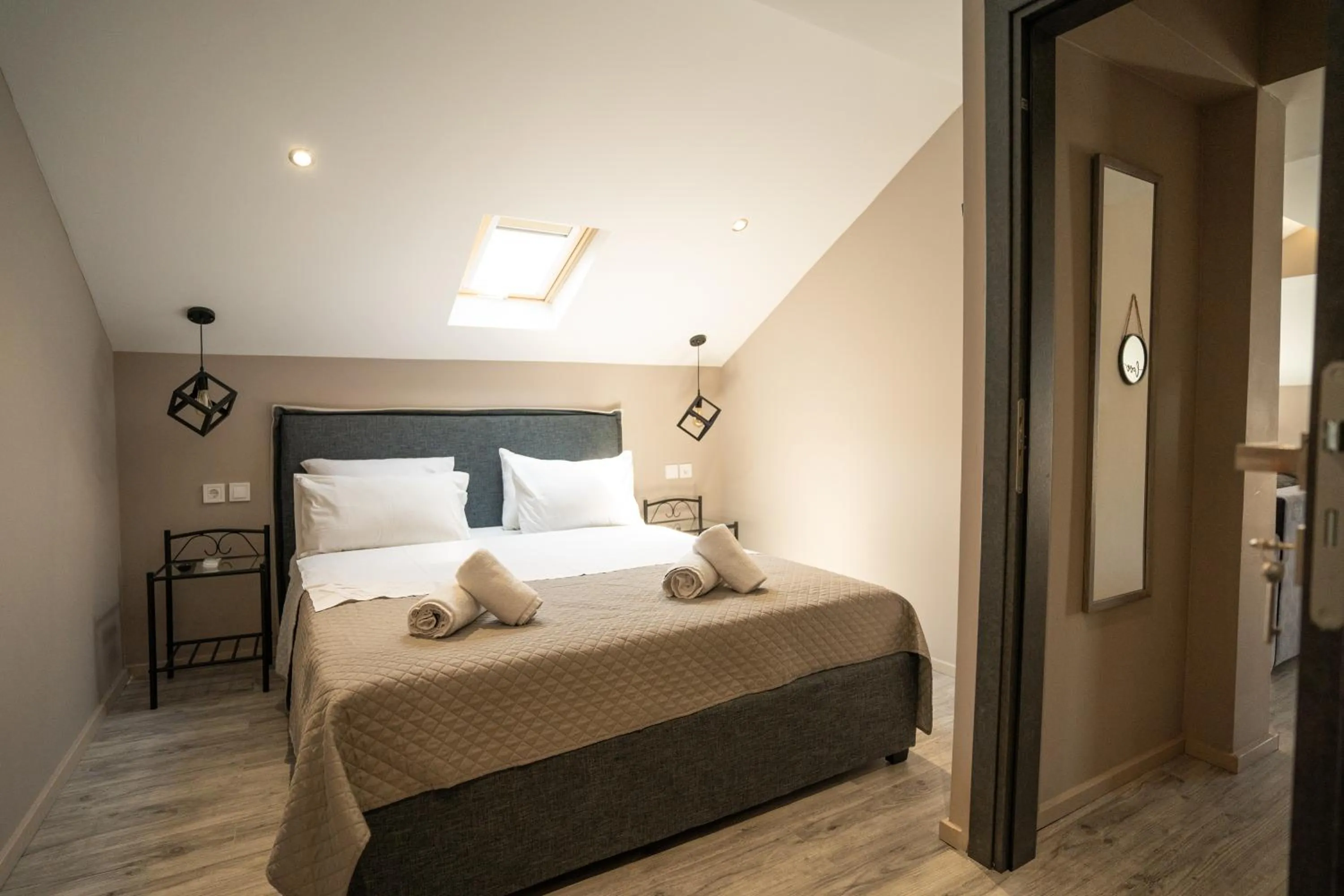 Bed in Parthenis Riviera Hotel