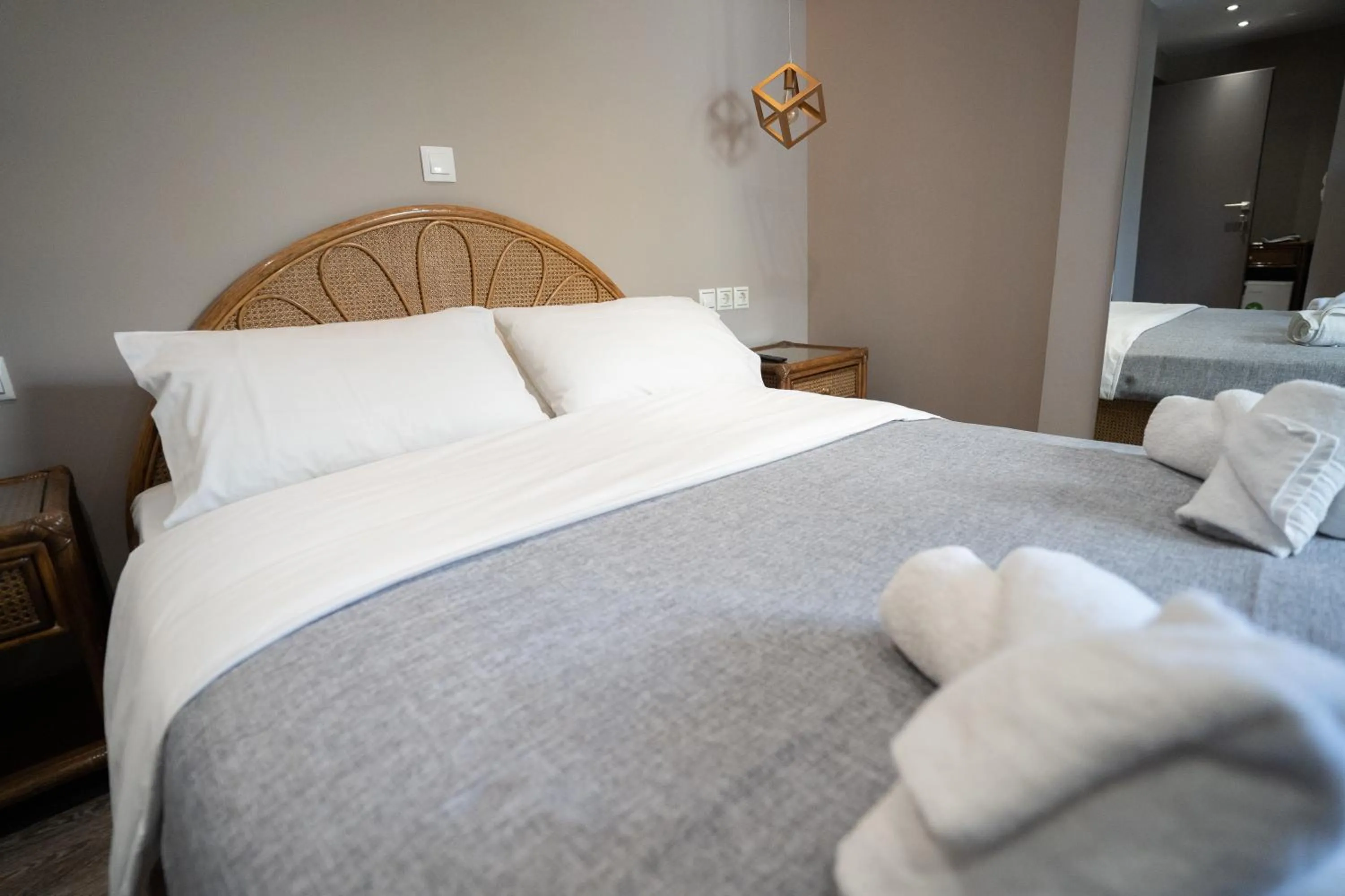 Bed in Parthenis Riviera Hotel