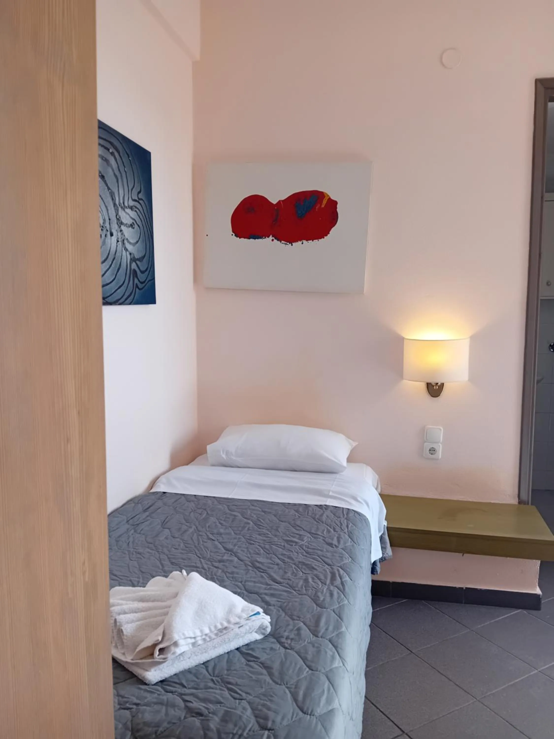 Bed in Heliotopos Apartments