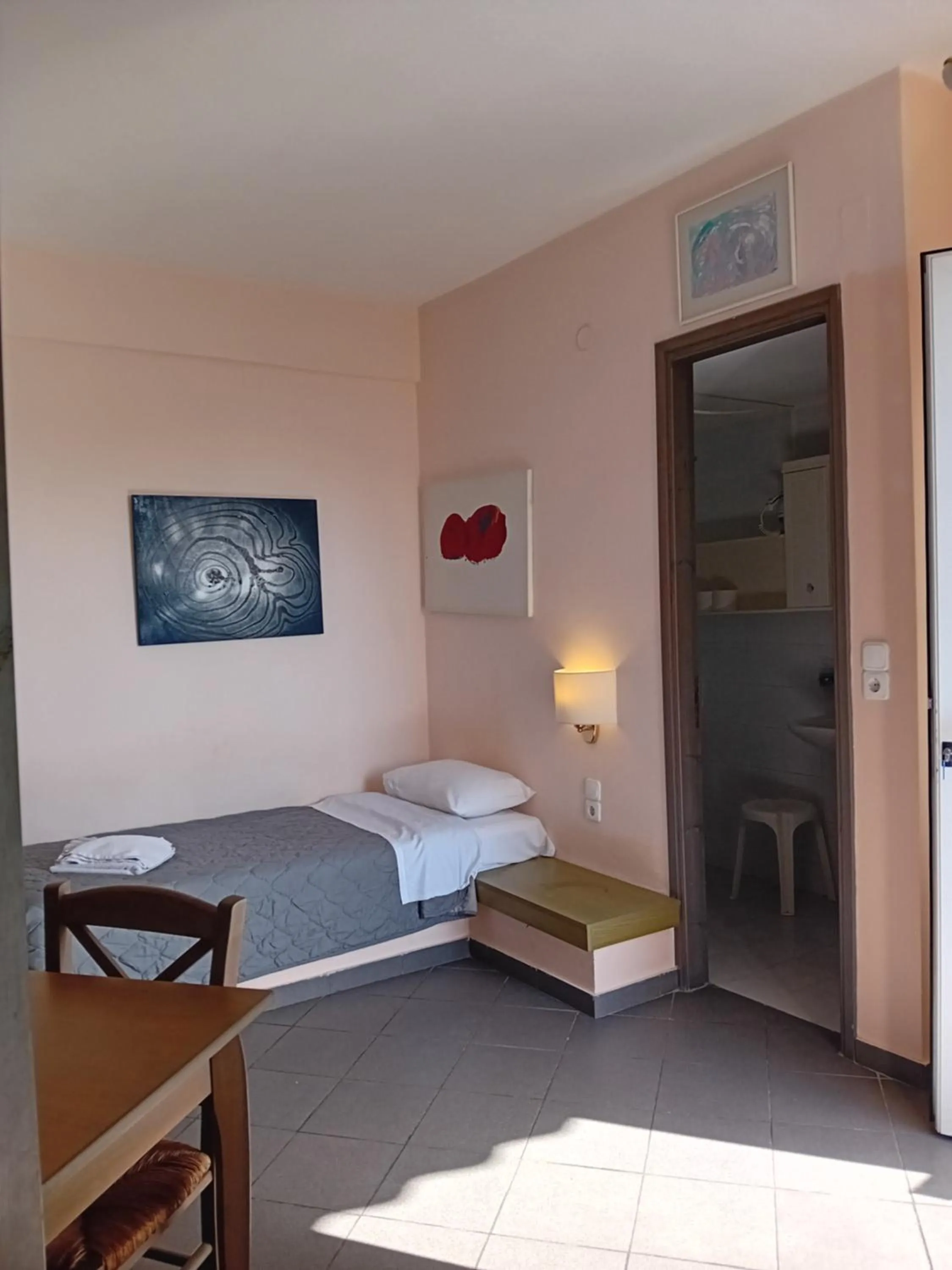 Bed in Heliotopos Apartments