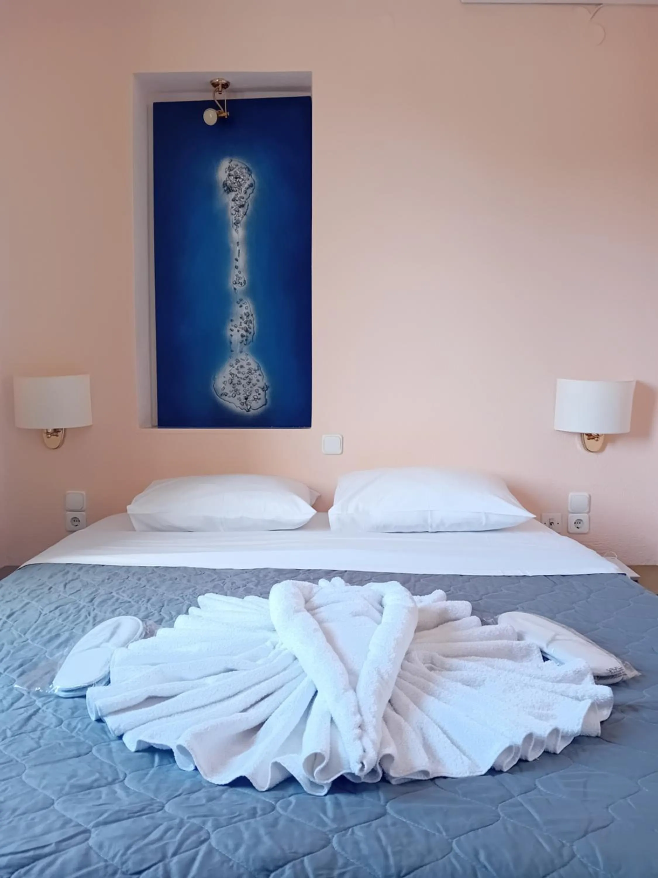 Bed in Heliotopos Apartments