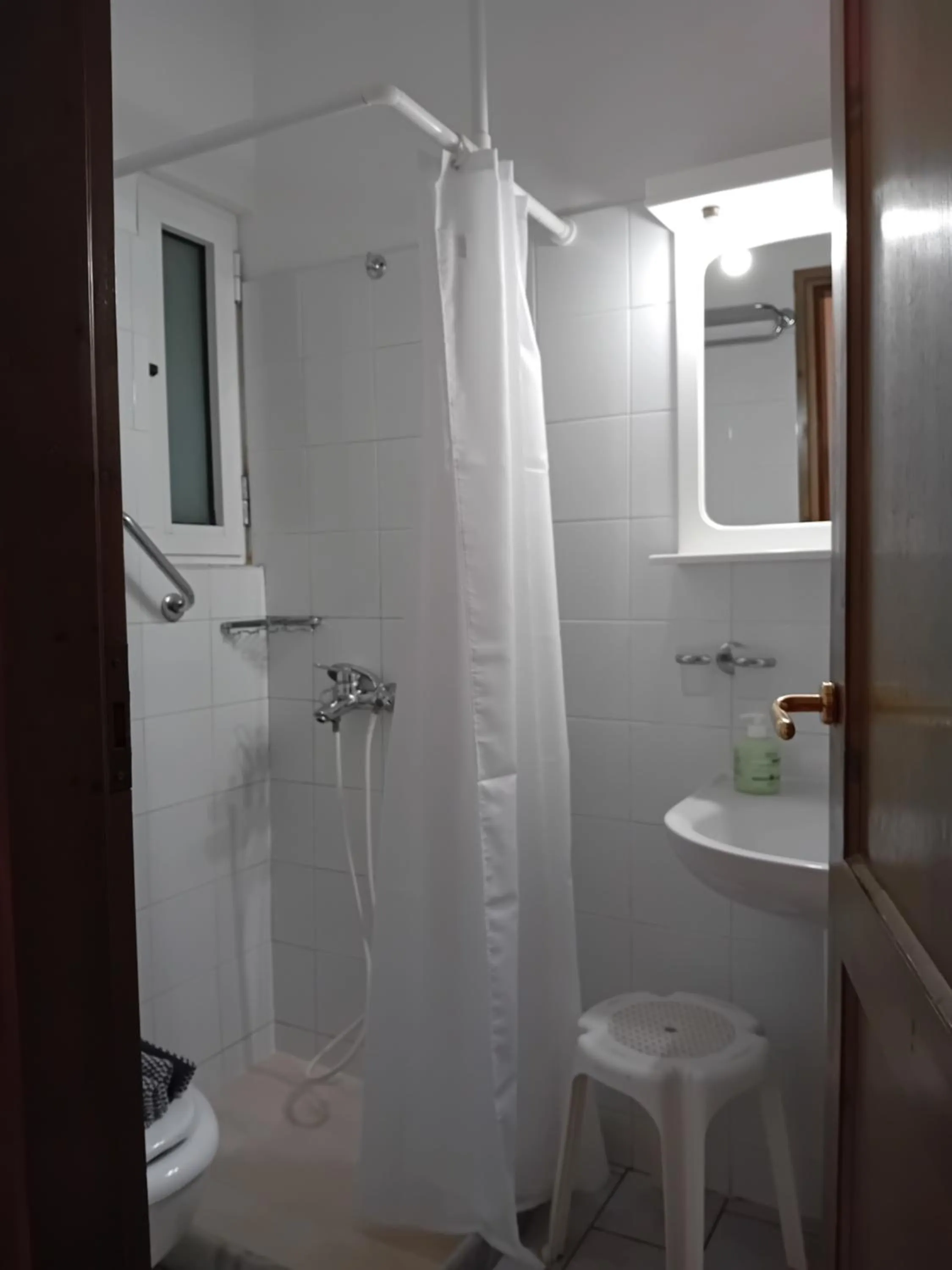 Bathroom in Heliotopos Apartments