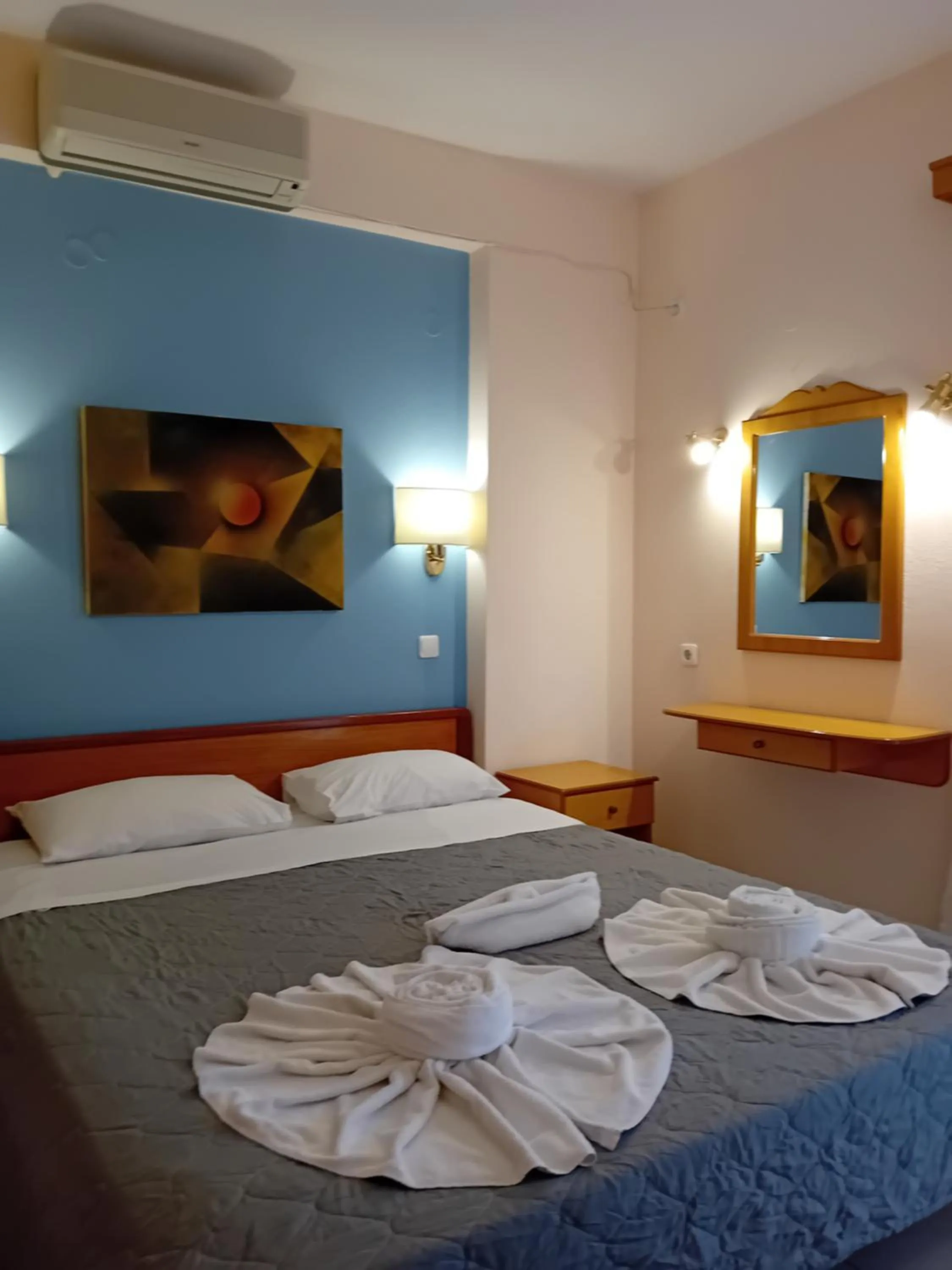 Bed in Heliotopos Apartments