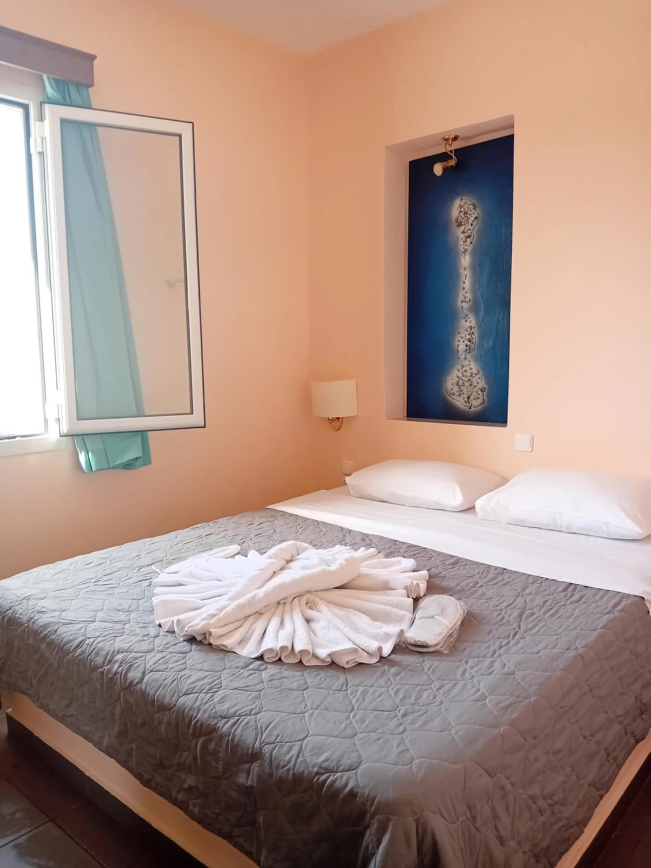 Bed in Heliotopos Apartments