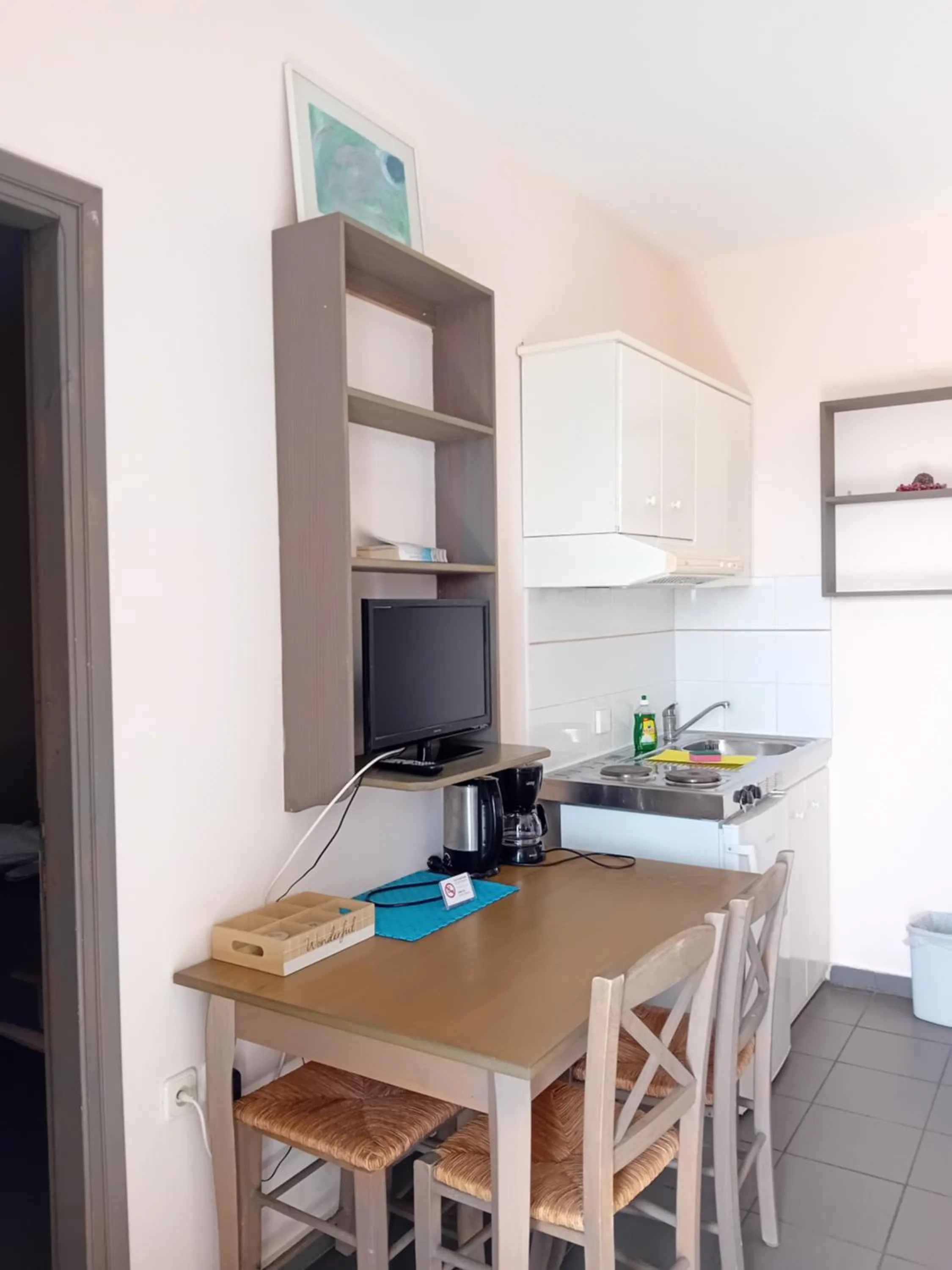 TV and multimedia in Heliotopos Apartments