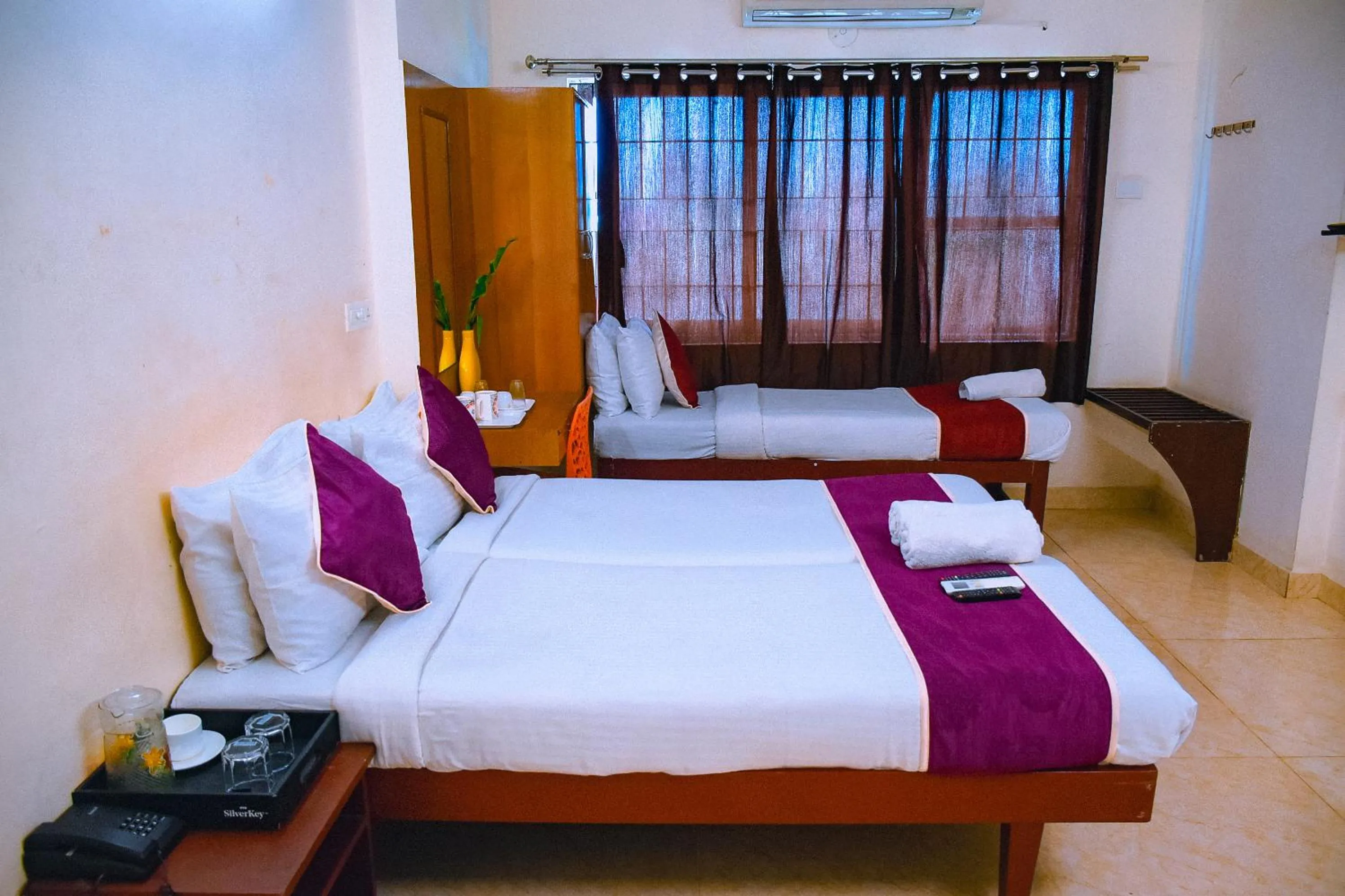 Bed in Naksha Tree Hotels Kishore Inn - Koyambedu