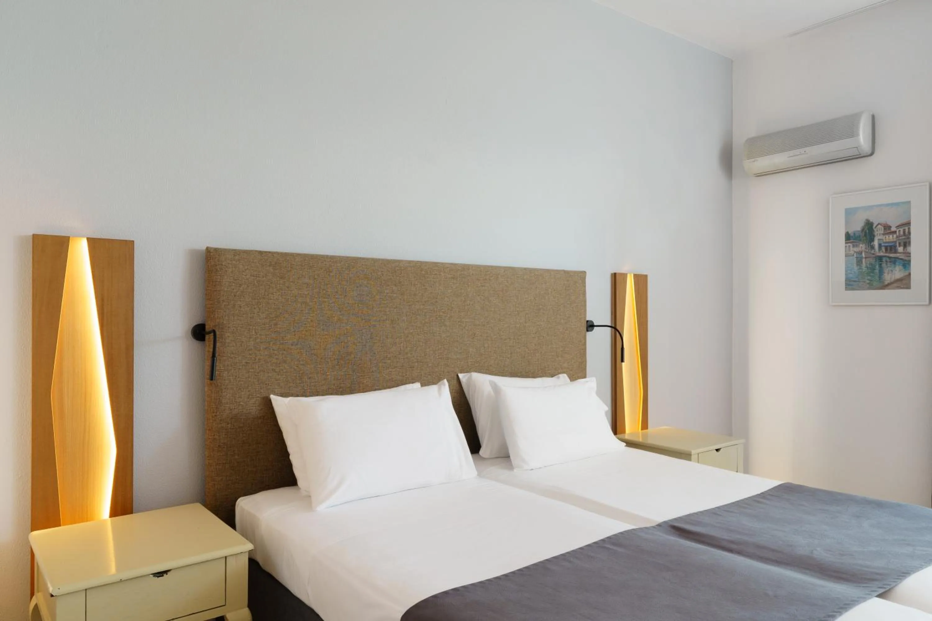 Bed in Palmariva Beach Hotel