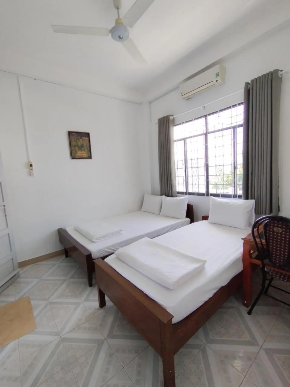 Photo of the whole room, Bed in Nhà Nghỉ SAO MAI