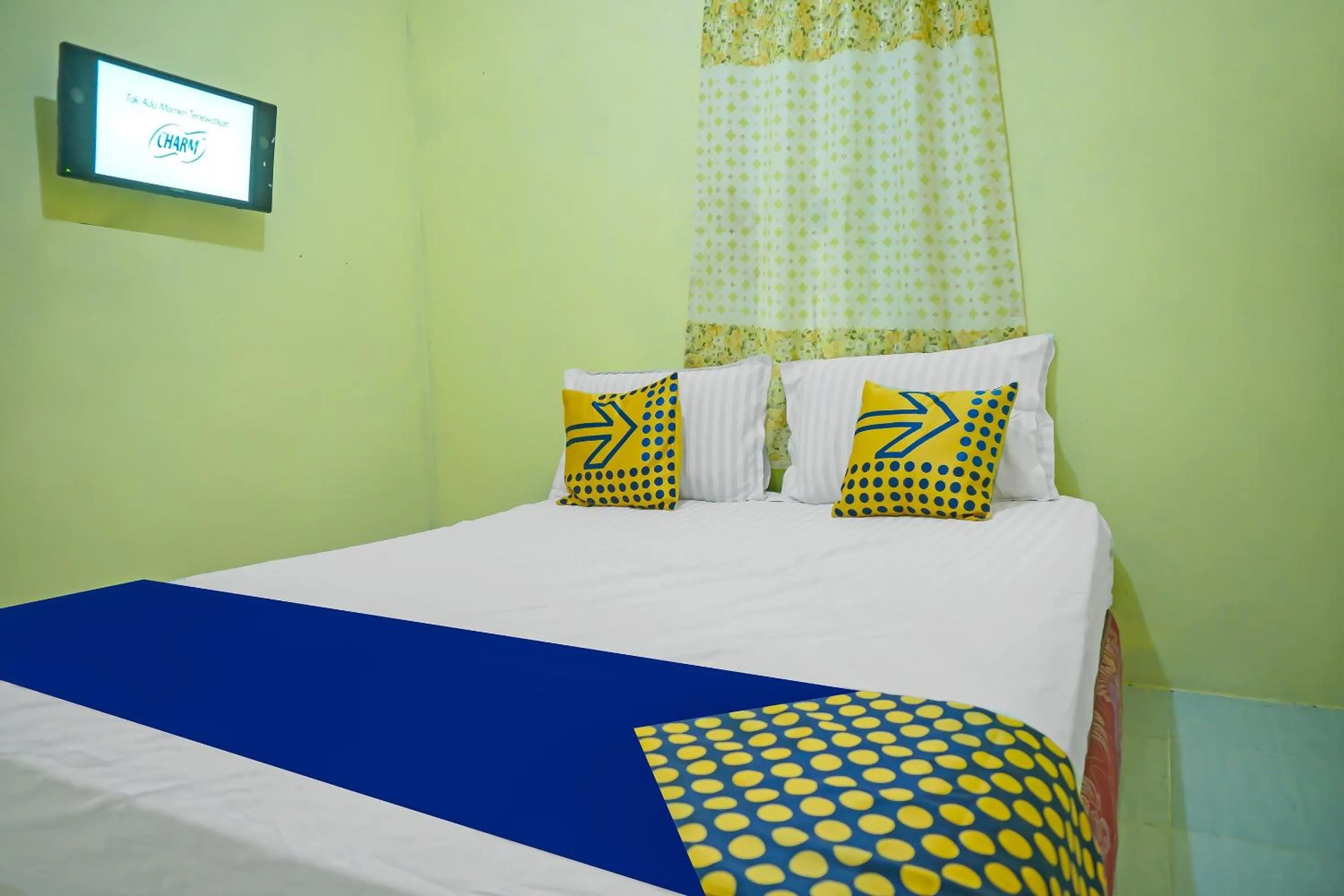 Bedroom in Hotel O Kost Qiu Qiu 99