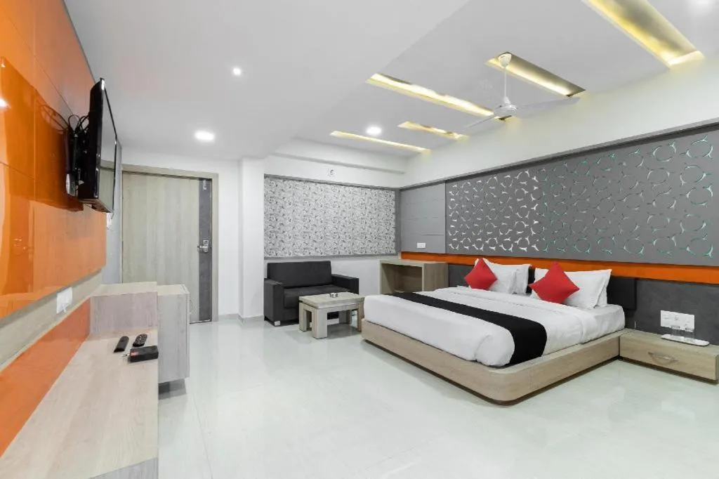 Bed in The Grand Takshak Hotel