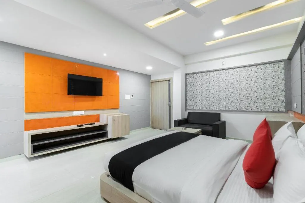 Bed in The Grand Takshak Hotel