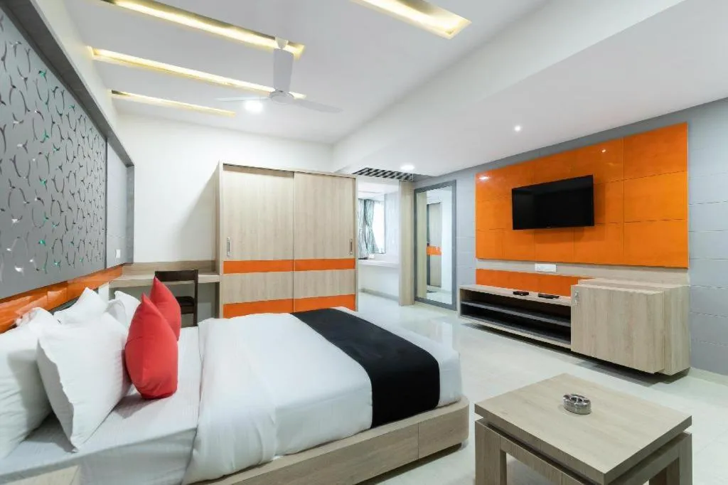 Bed in The Grand Takshak Hotel