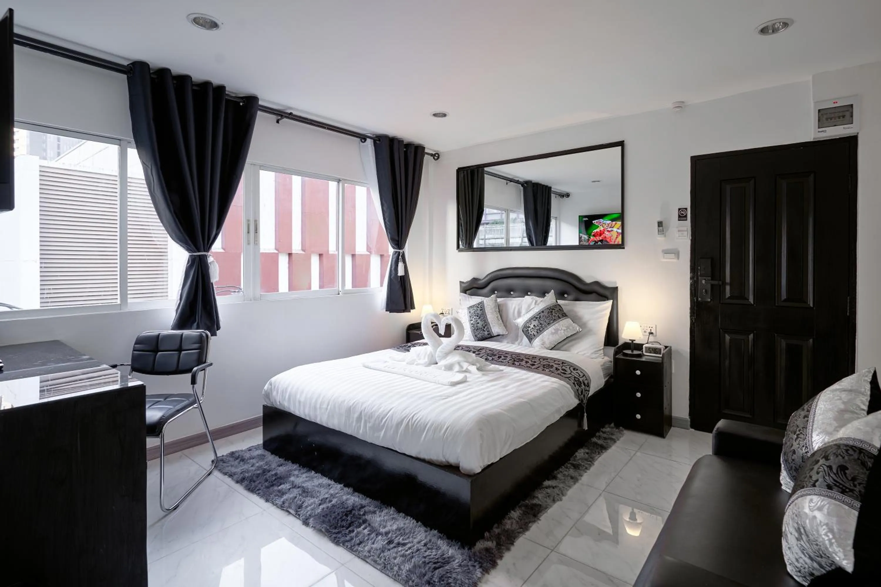 Bed in Thonglor Suites Hotel