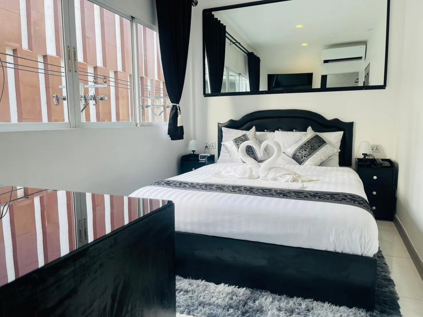 Bed in Thonglor Suites Hotel