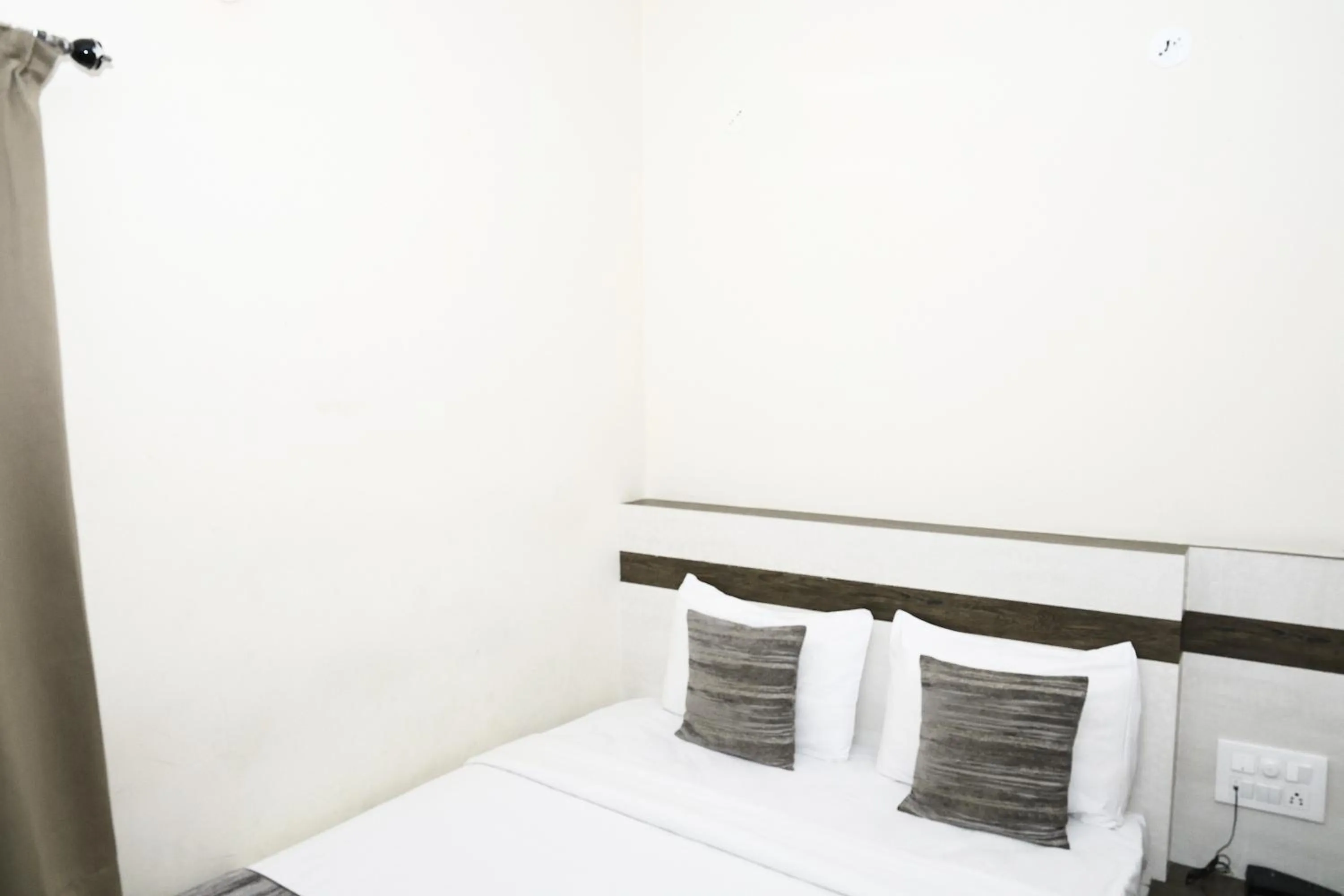 Bed in Hotel JP Grand