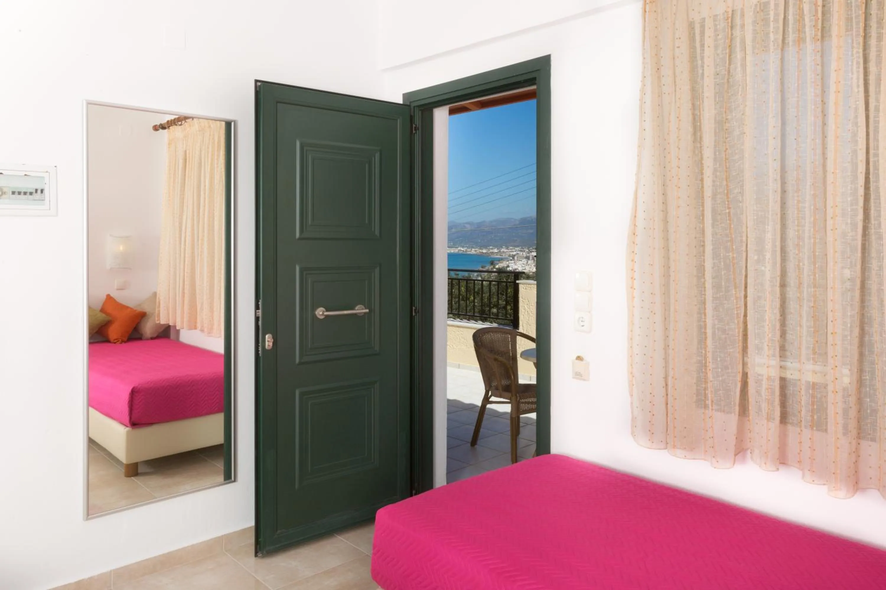 Seating area, Bed in Mariamare apts