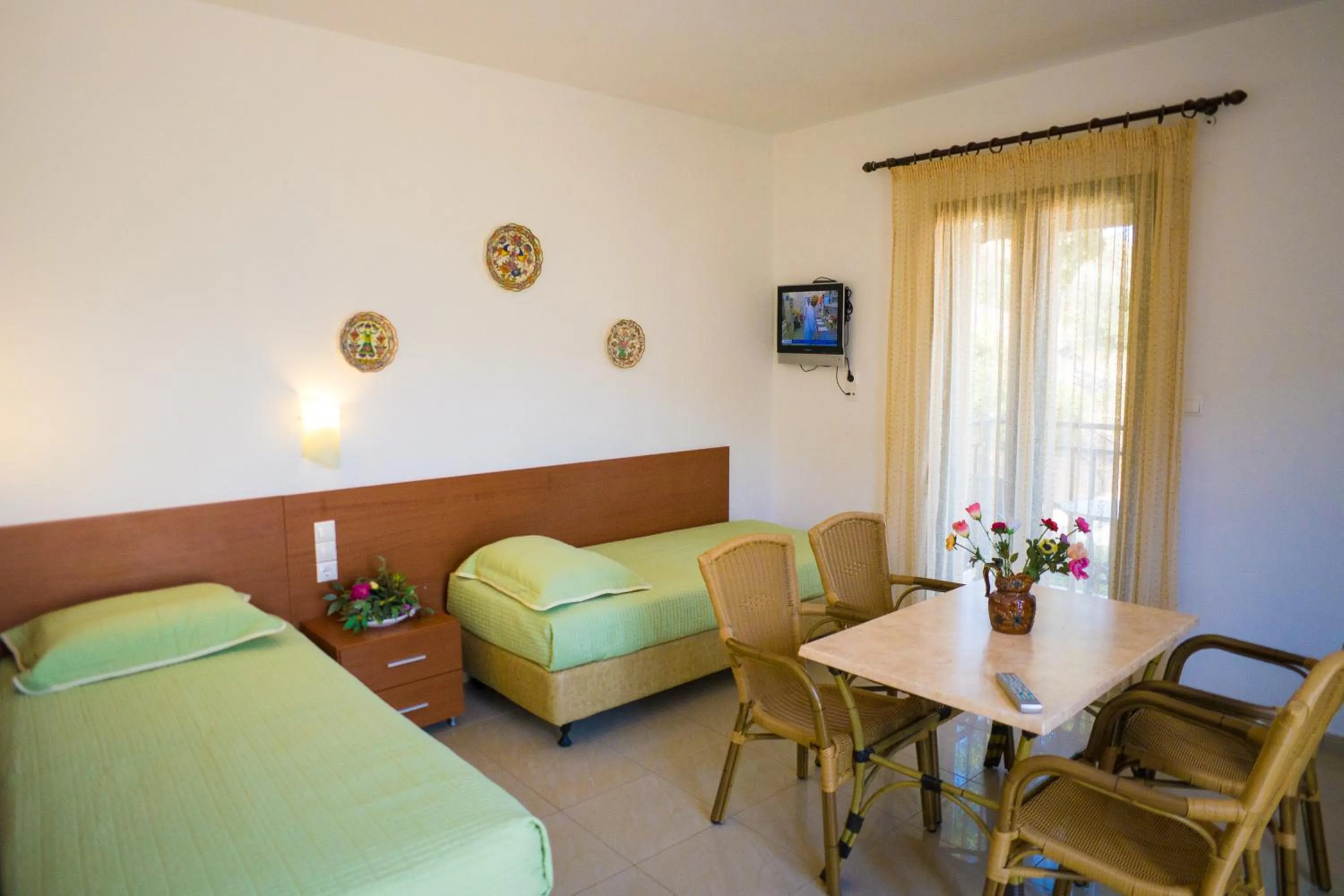 Seating area, Bed in Mariamare apts