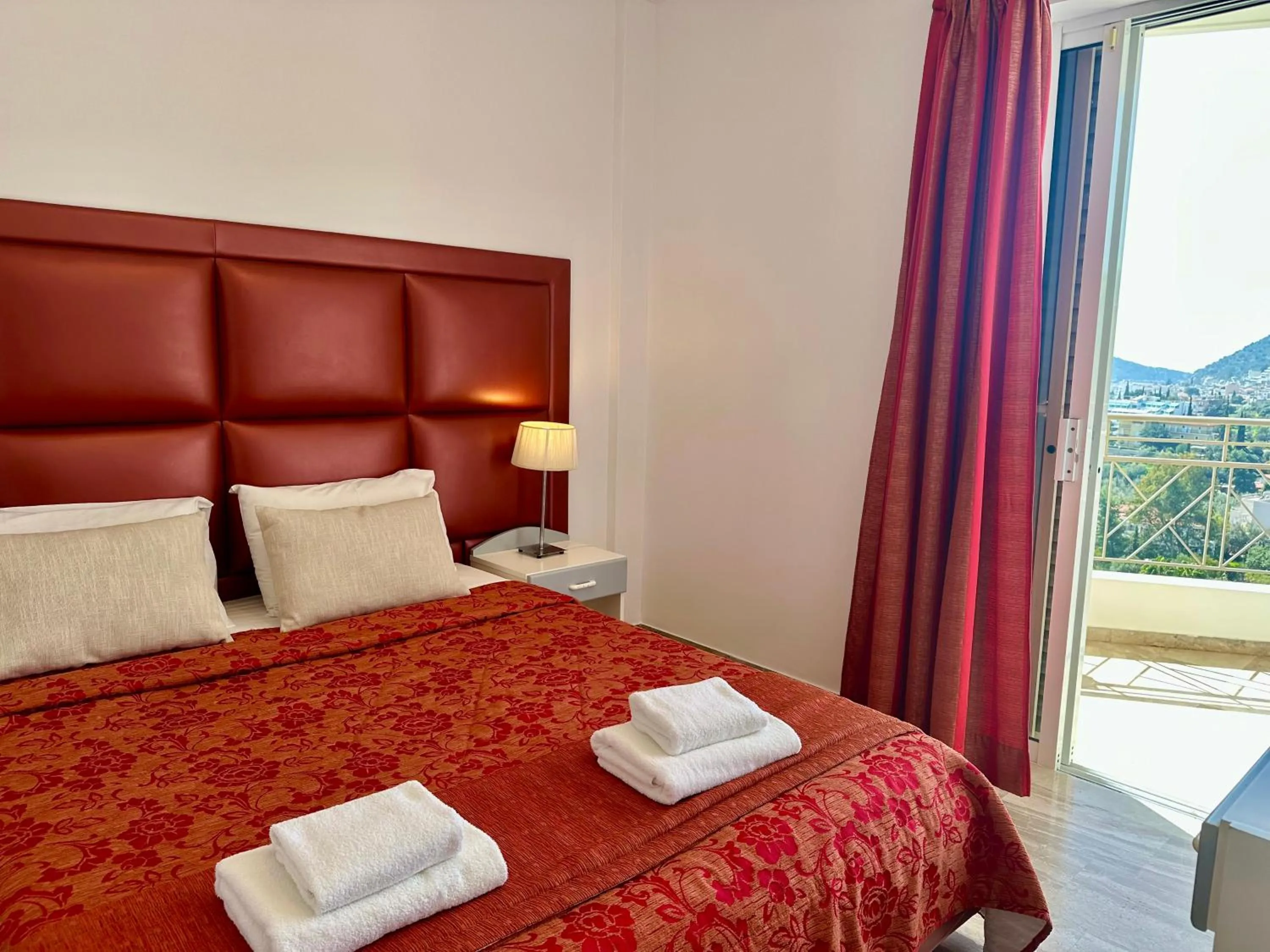 Bed in Hotel Apartments Panorama