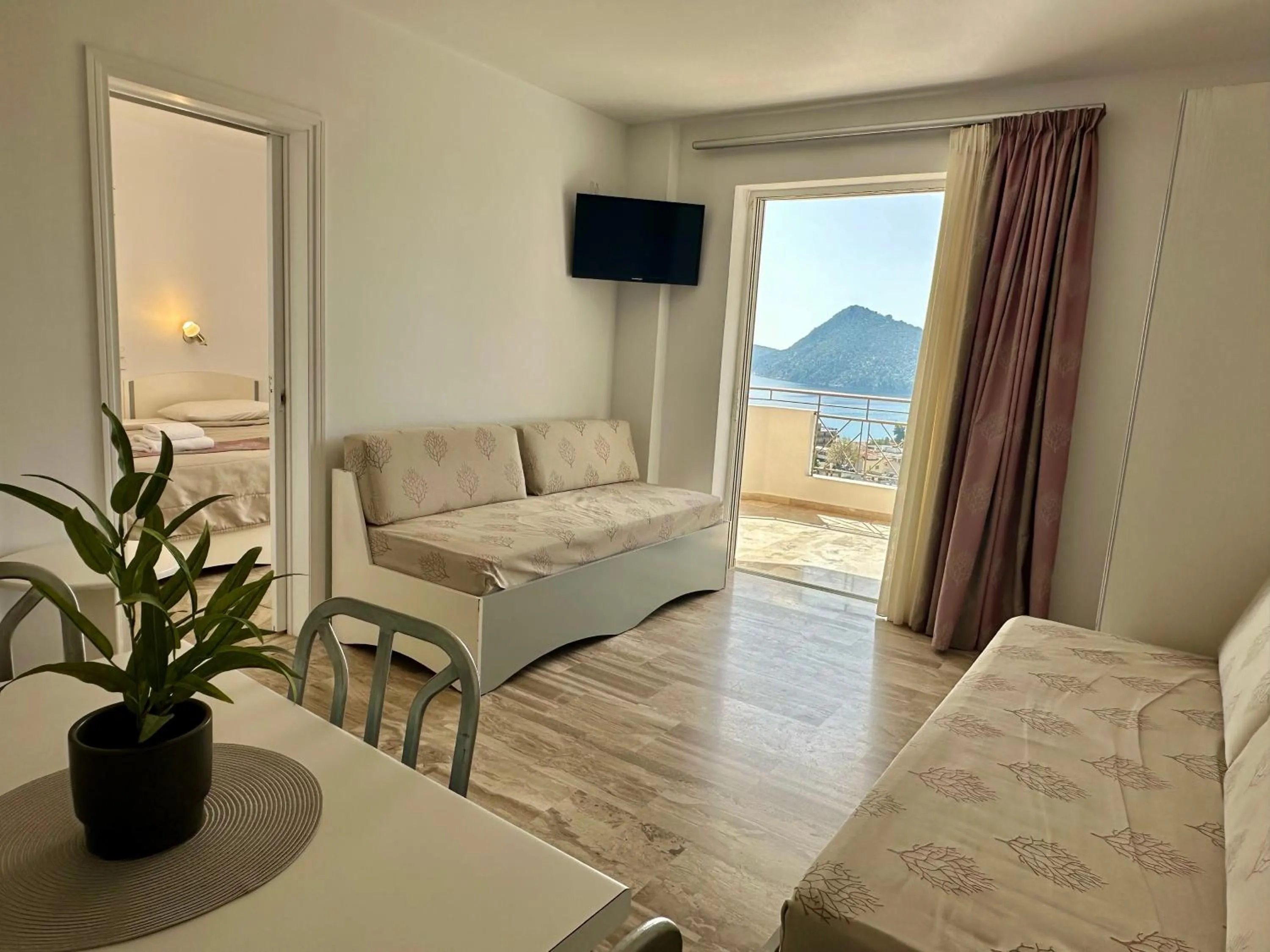 Bed in Hotel Apartments Panorama