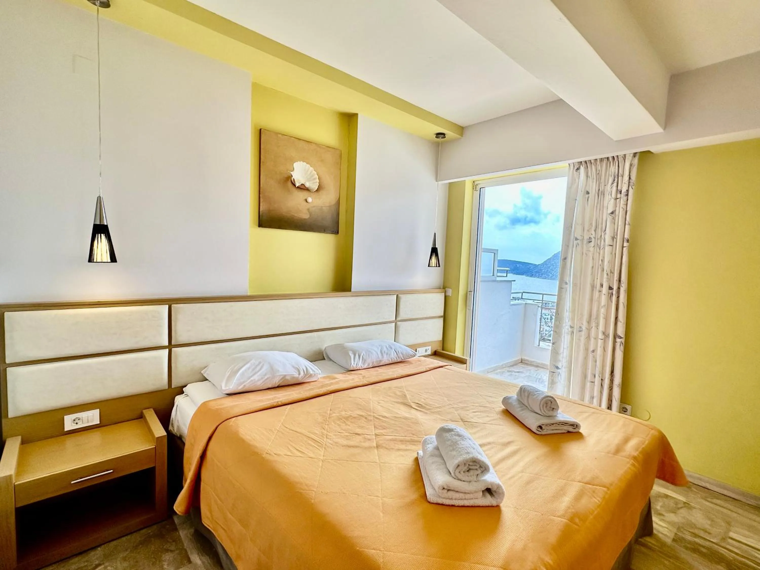 Bed in Hotel Apartments Panorama