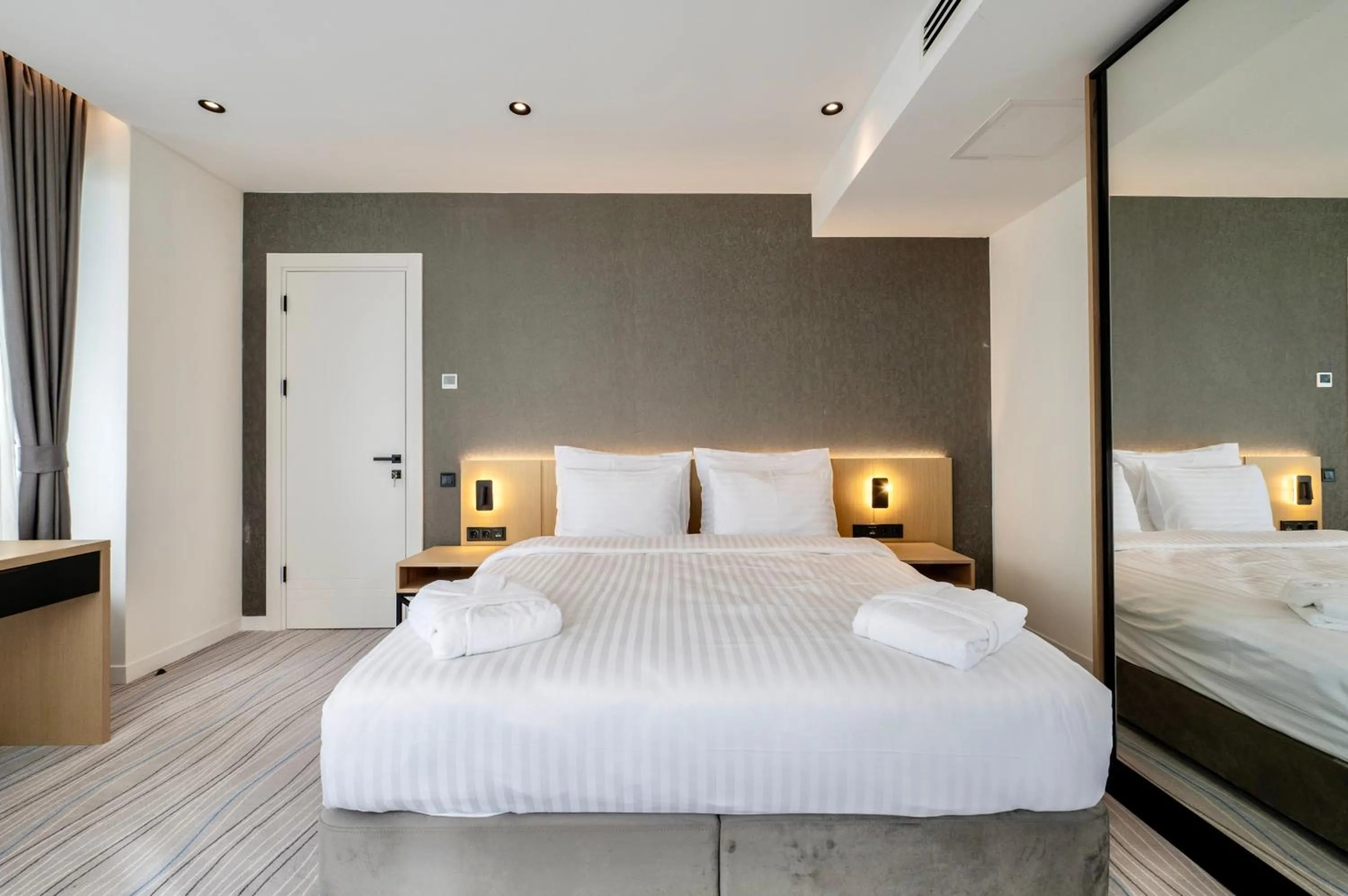 Bed in The Grandeur Hotel