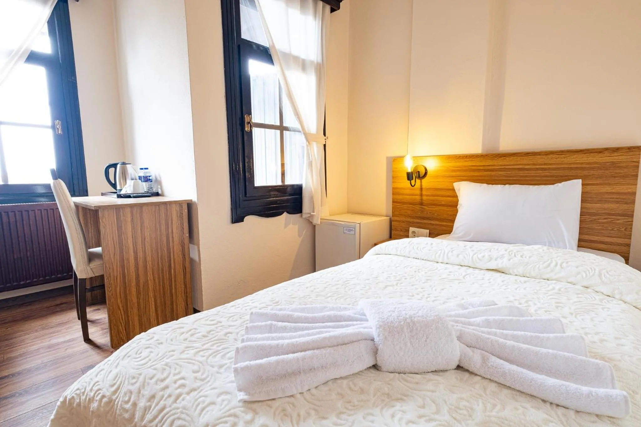 towels, Bed in Simre Inn Hotel Safranbolu