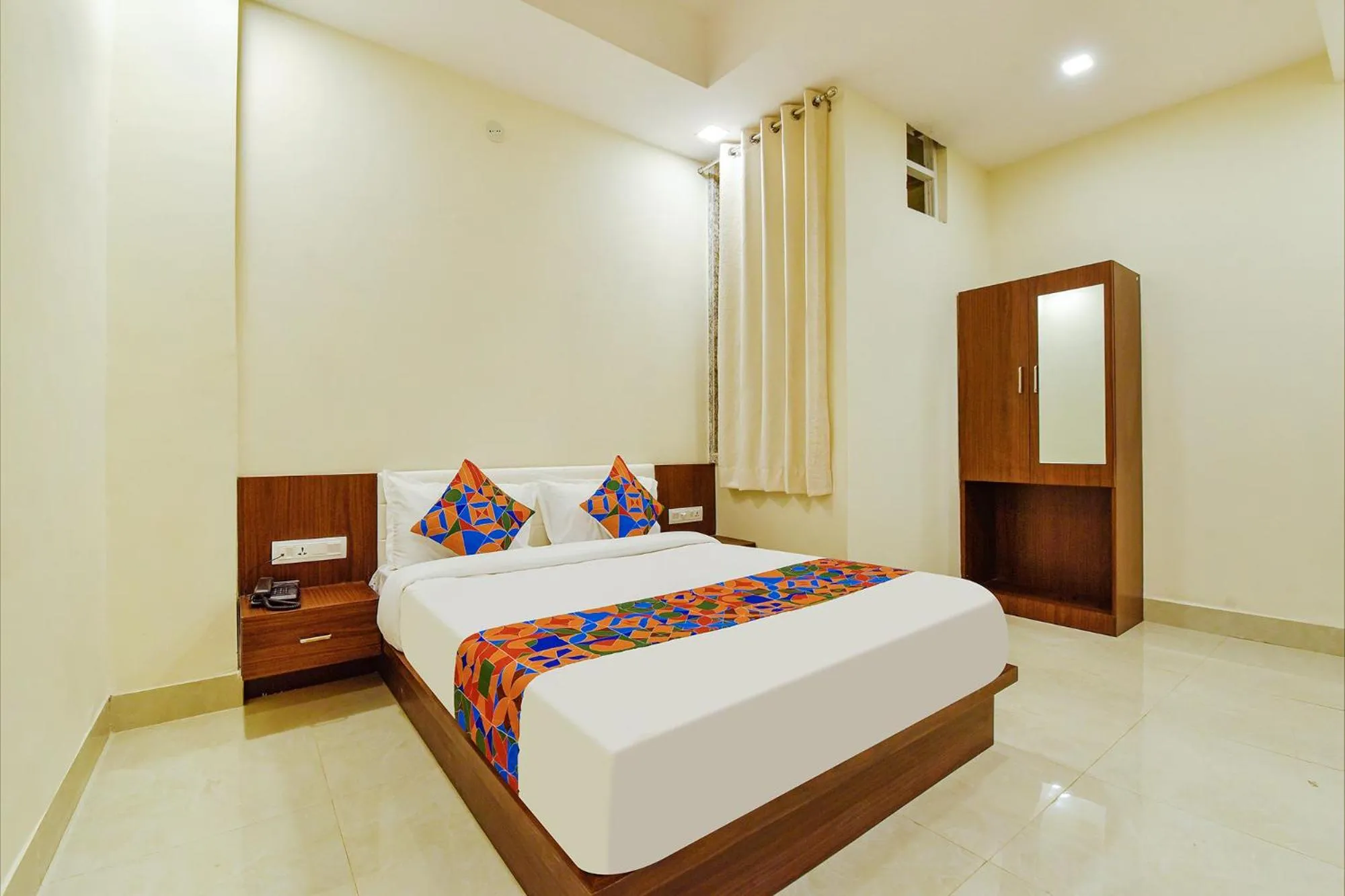 Bed in FabHotel Diamond I