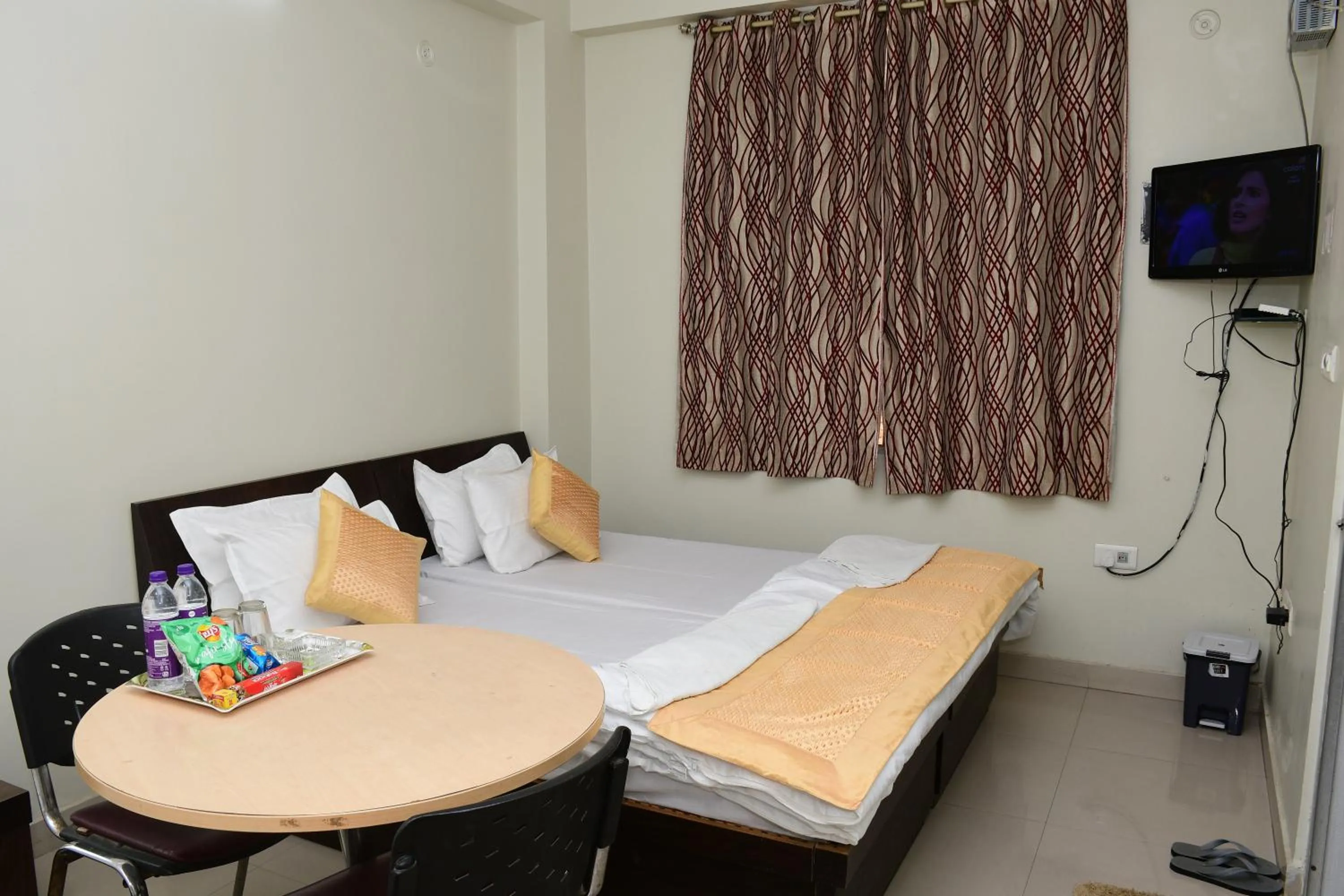 Bed in Hotel Buddha International