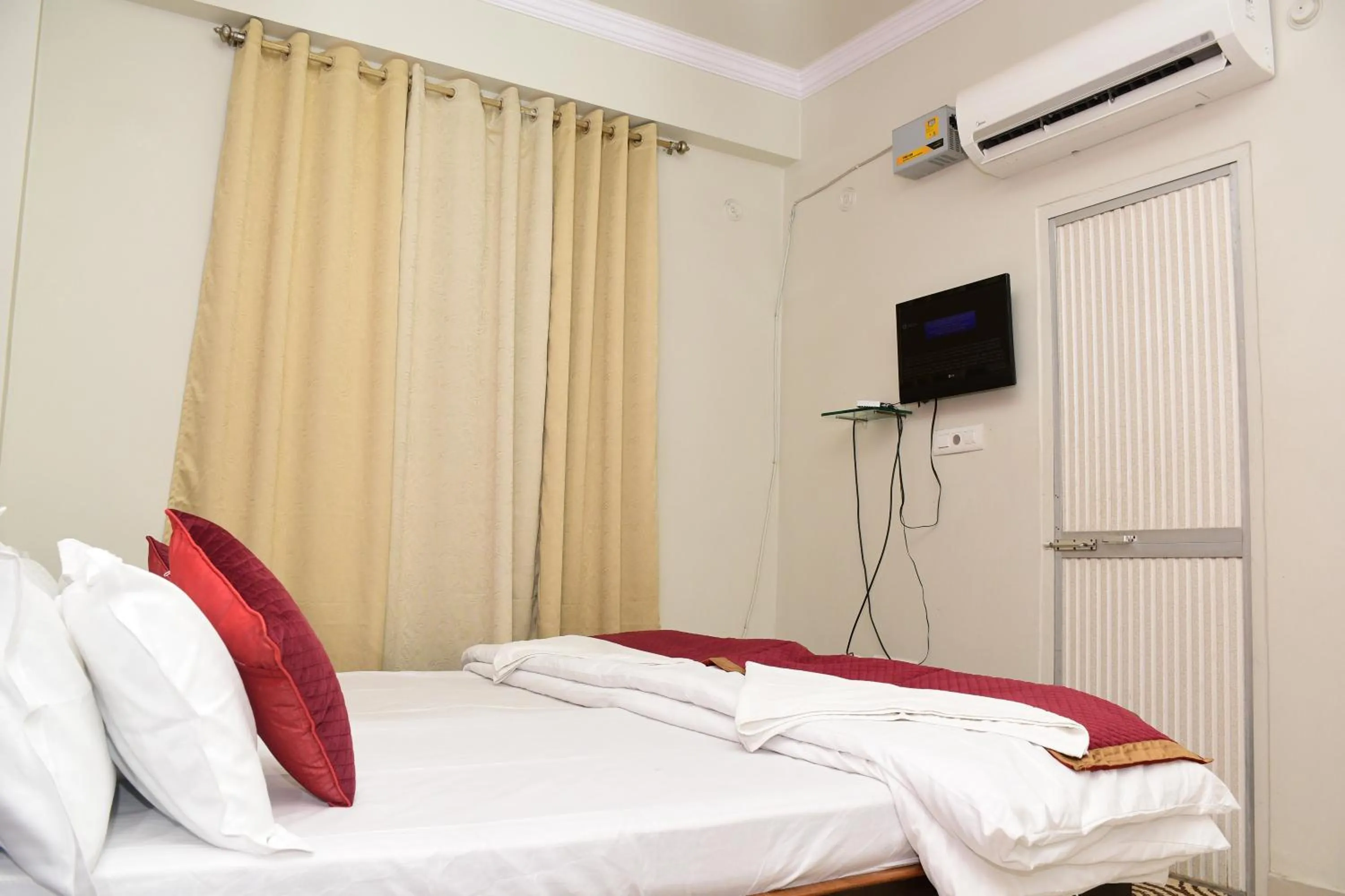 Bed in Hotel Buddha International