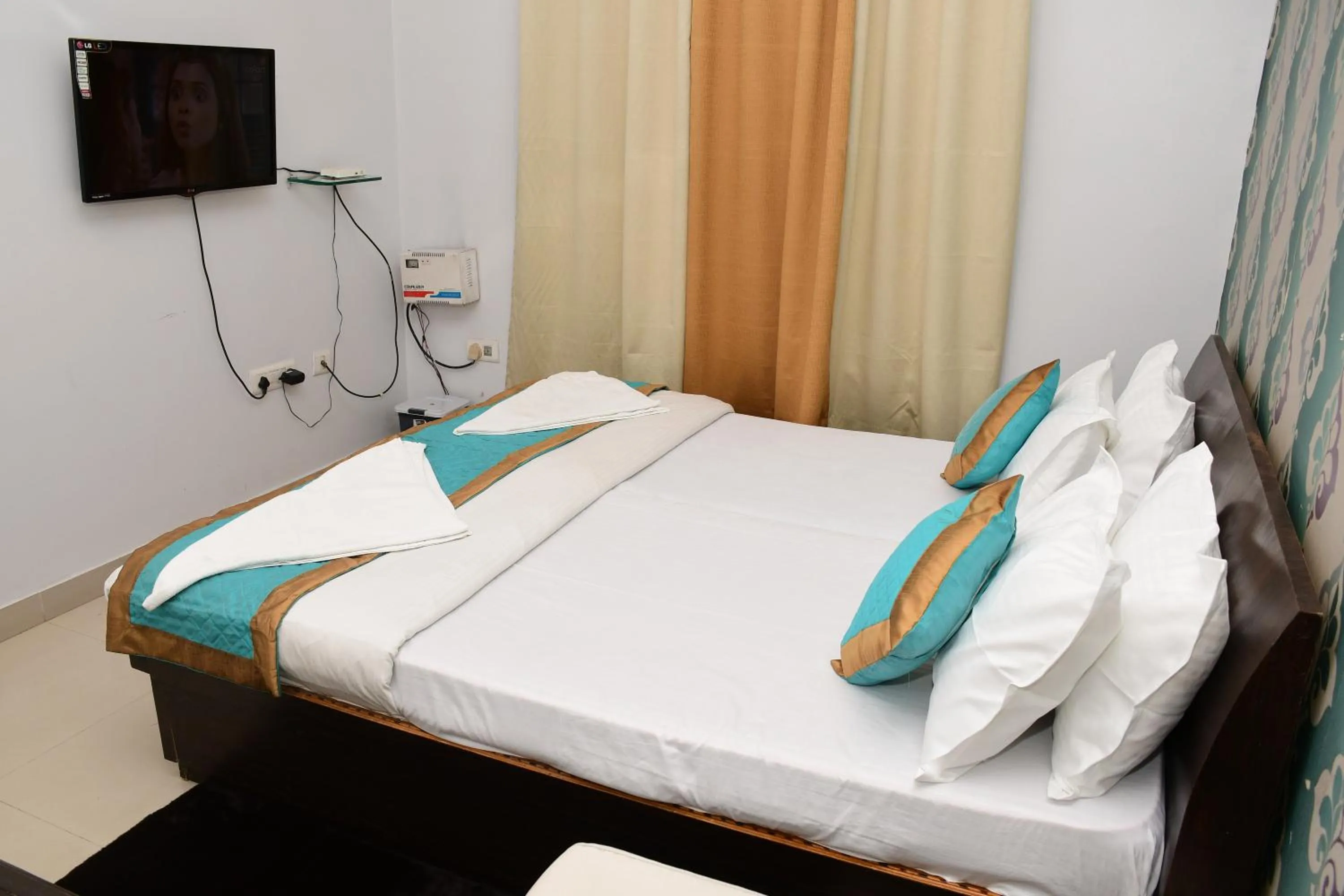 Bed in Hotel Buddha International