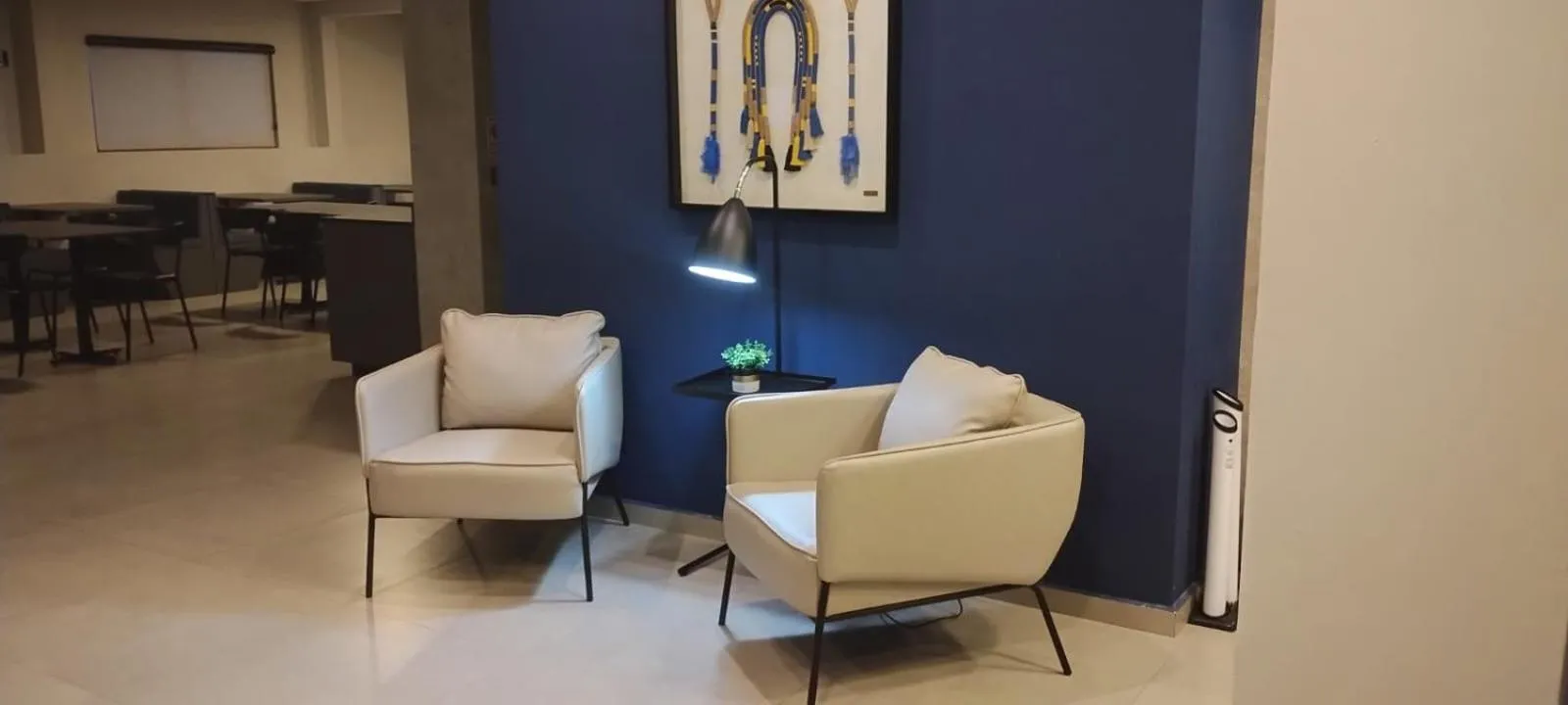 Communal lounge/ TV room in Hotel Coroados Foz Express