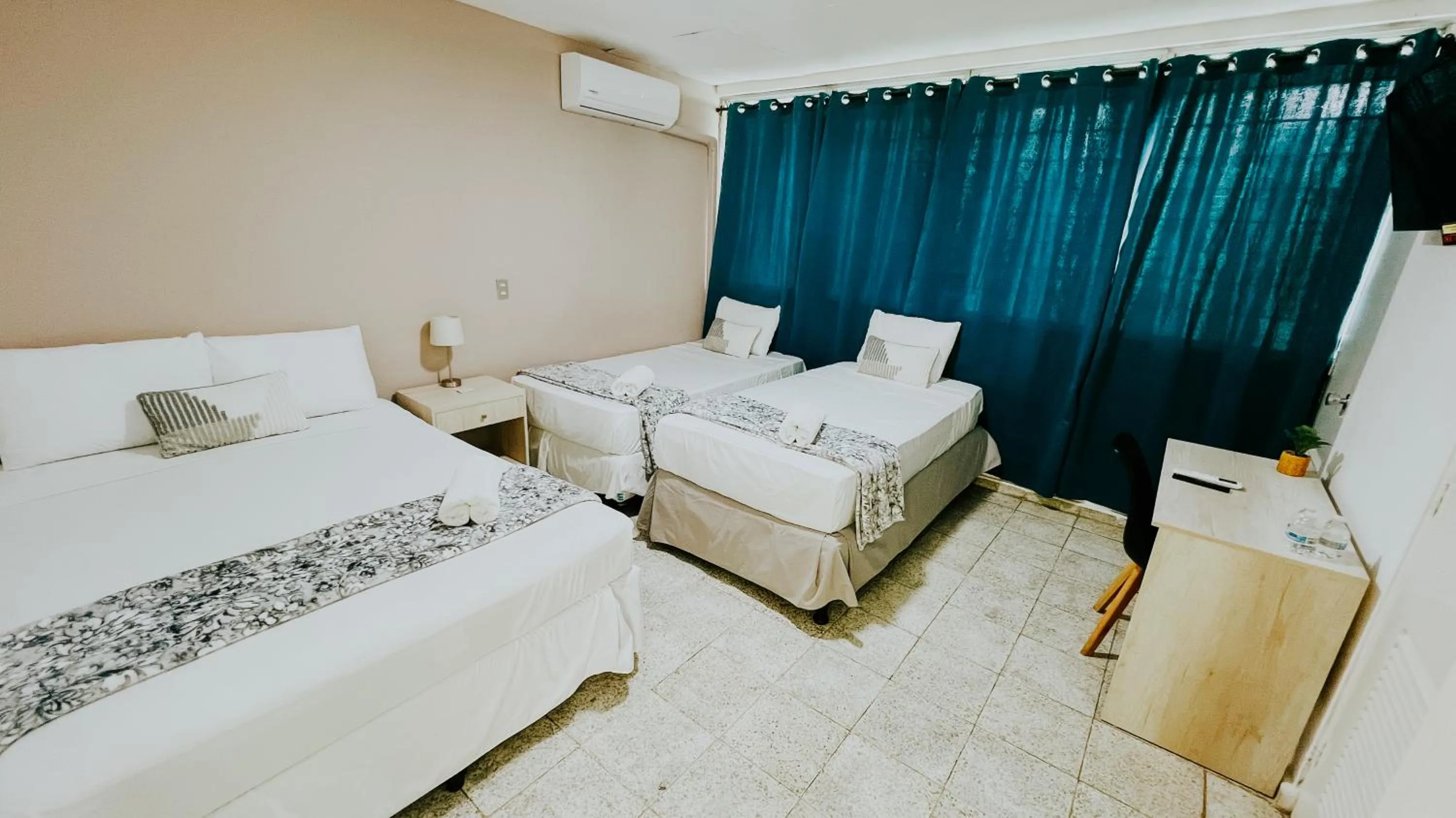 Bed in LA RUTA HOTEL CORPORATIVO